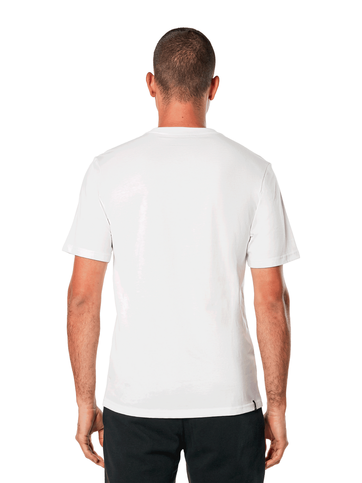 Alpinestars MX Helmet CSF Tee, kortærmet t-shirt, hvid, set bagfra, båret med sorte bukser, afslappet motorsport-inspireret design