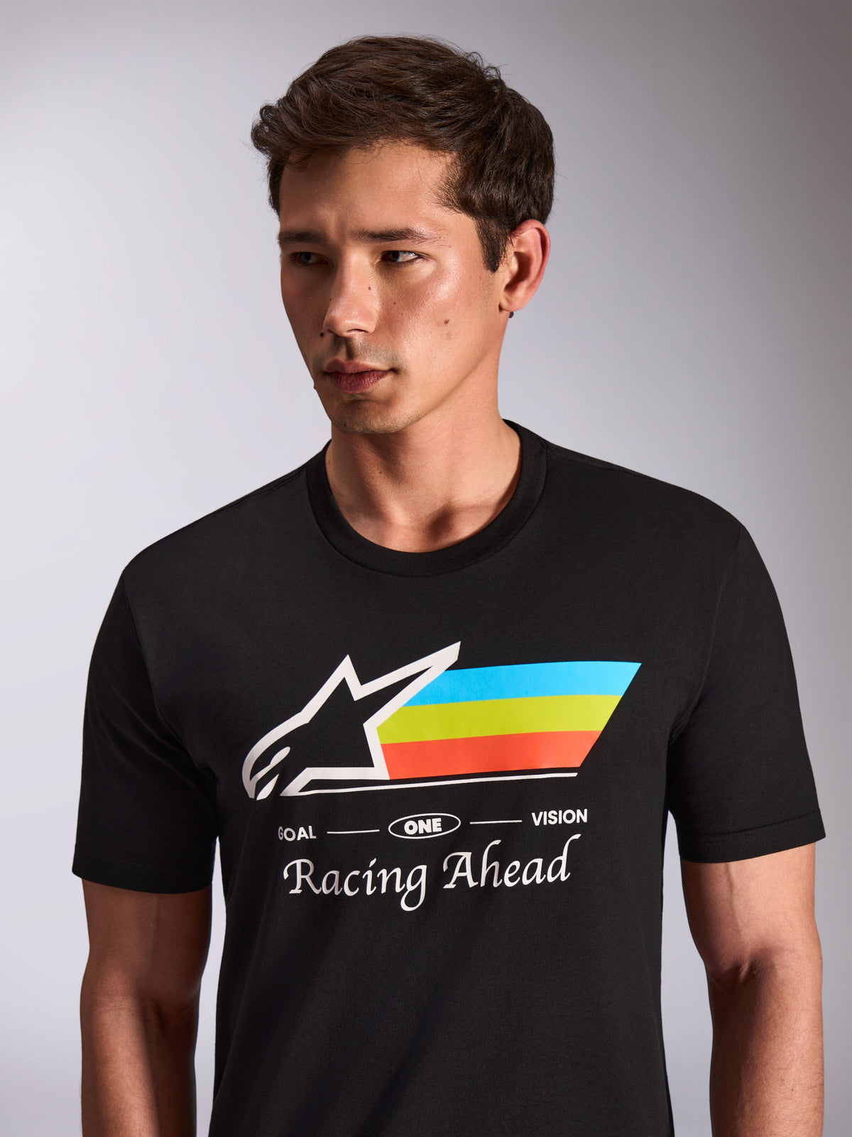Alpinestars Trifecta CSF Tee, Short Sleeve T-Shirt, Black, White Astars Logo with Blue Yellow and Orange Stripes, Racing Ahead graphic, Casual Motorsport Sportswear