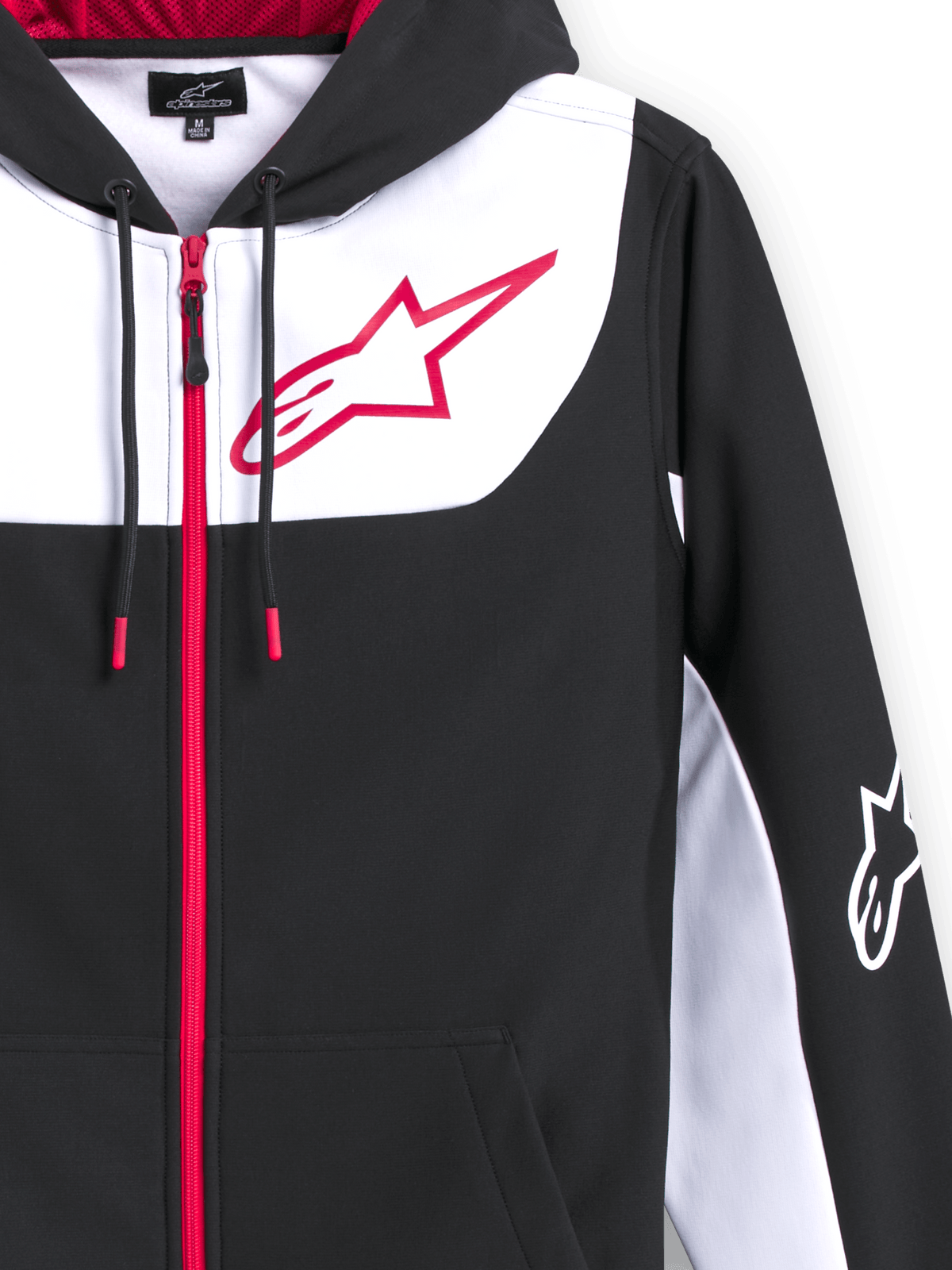 Alpinestars Sessions V3 hættetrøje, poly-fleece hættetrøje med lynlås, sort med hvide og røde detaljer, stort rødt Alpinestars stjerne-logo på brystet, rød lynlås foran, snore med røde spidser og hvidt logo på ærmet, afslappet motorsport-inspireret design