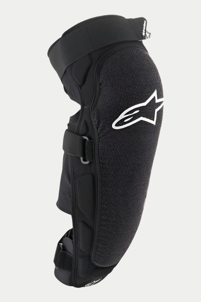 Alpinestars Ve cto r Pr o kn æ-/s ki nne ben sbes kyt ter, sor t, med hvi dt Al pin est ars -log o på kn æet, tek stu rer et sli dst ærk t fro ntp ane l, jus ter bar e kro g-o g-l økk e str opp er, ånd bar t MTB -be sky tte lse sud sty r