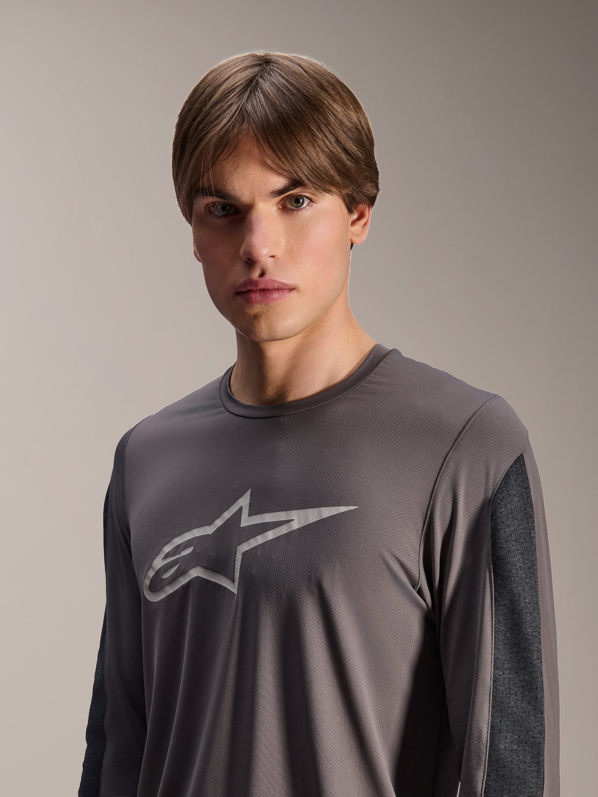 Alpinestars A-Dura Insert Astar Jersey, Long Sleeve MTB Jersey, Dark Gray, featuring a light gray Astar logo on the chest and contrasting dark gray sleeve panels, technical performance wear for off-road cycling