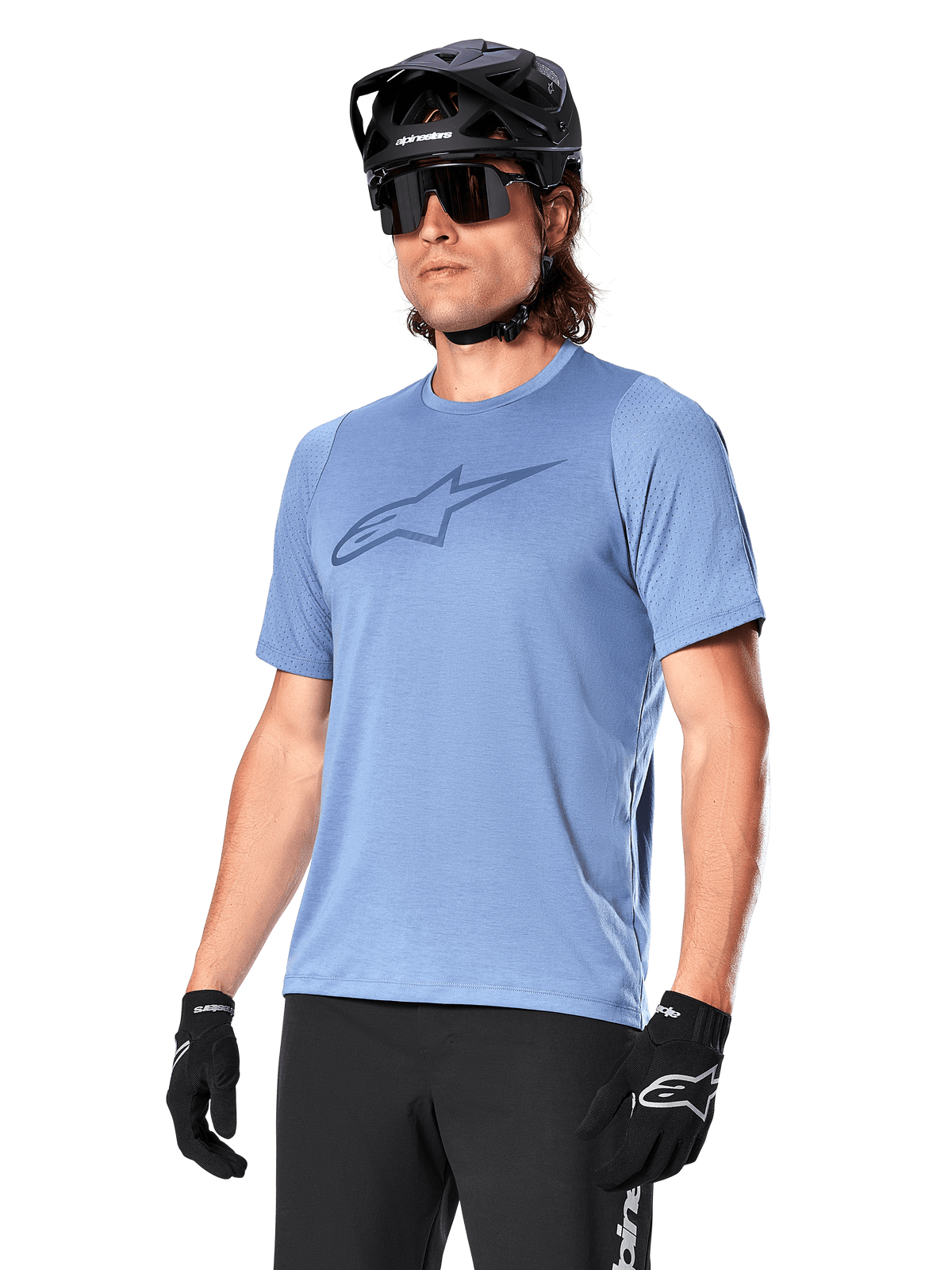 Alpinestars A-Dura Dri Astar Jersey Short Sleeve, Infinity Blue, mountain bike jersey with mesh sleeve ventilation and a large chest logo, worn with black helmet, sunglasses, and gloves, technical MTB performance apparel