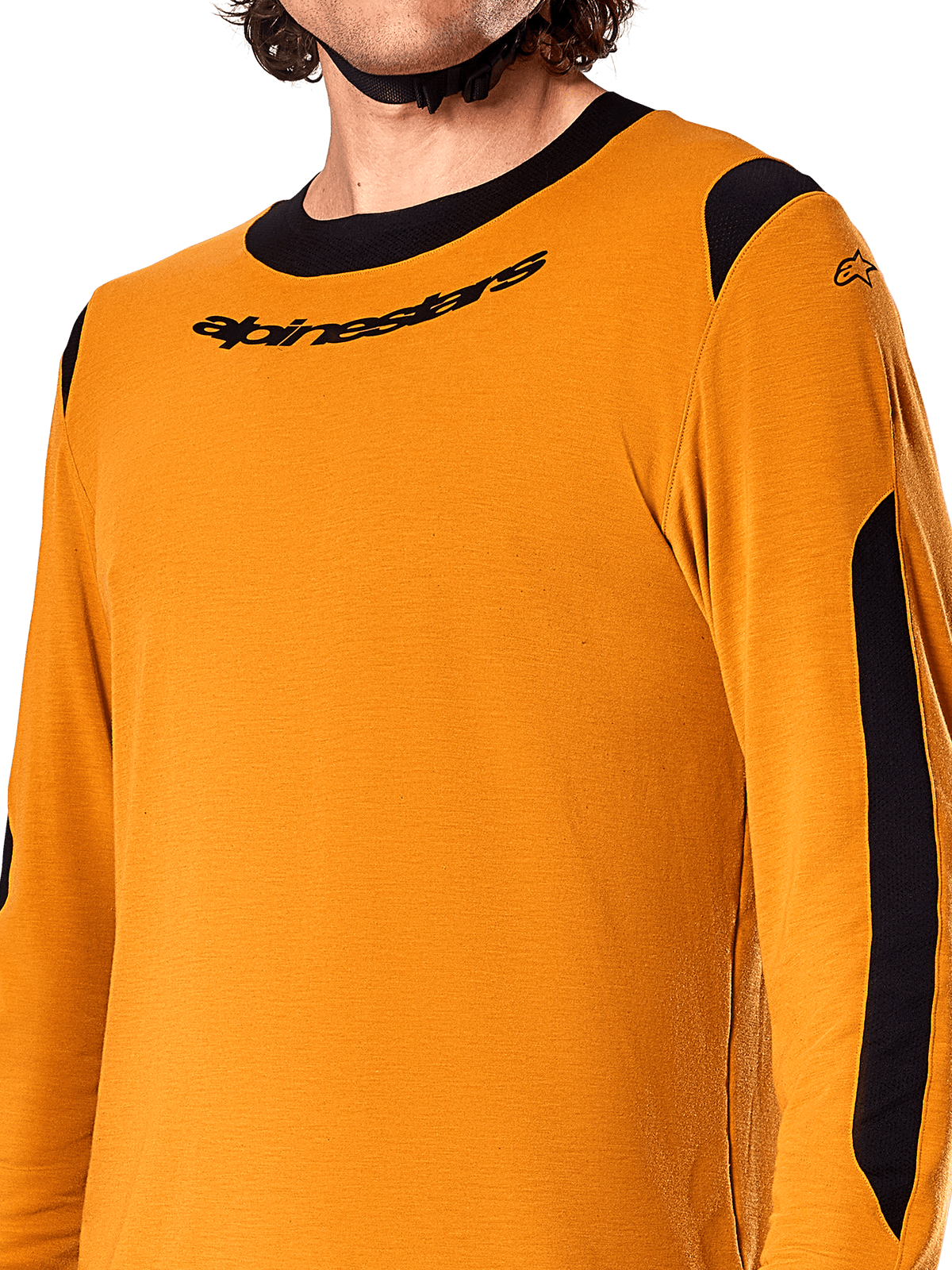 Alpinestars A-Dura Dri Wool Long Sleeve Jersey, Dark Gold, close-up showing black crew-neck collar with logo and black mesh ventilation panels on the shoulders and arms, high-performance mountain bike apparel