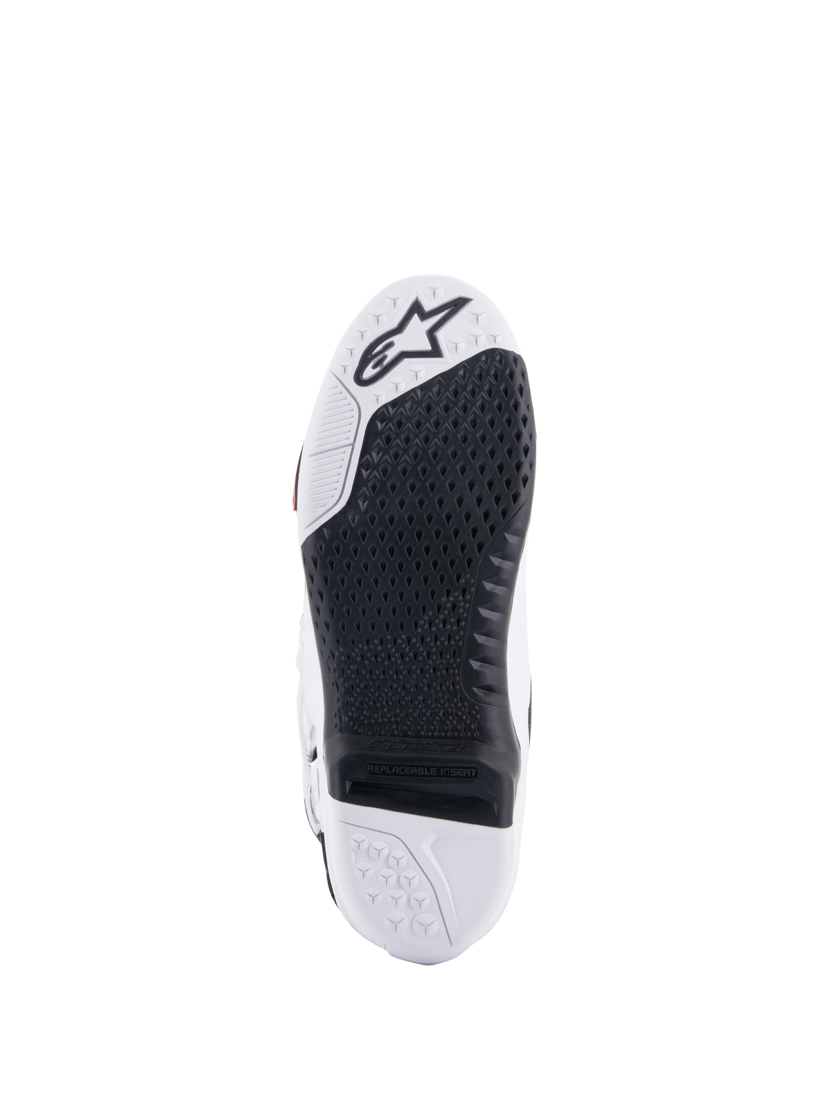 Alpinestars Tech 10 støvler, motocross-støvler, bundvisning der viser den sorte udskiftelige centrale indsats og den hvide sål, tekstureret grebsmønster, Alpinestars stjernelogo på tåområdet, holdbart off-road fodtøj