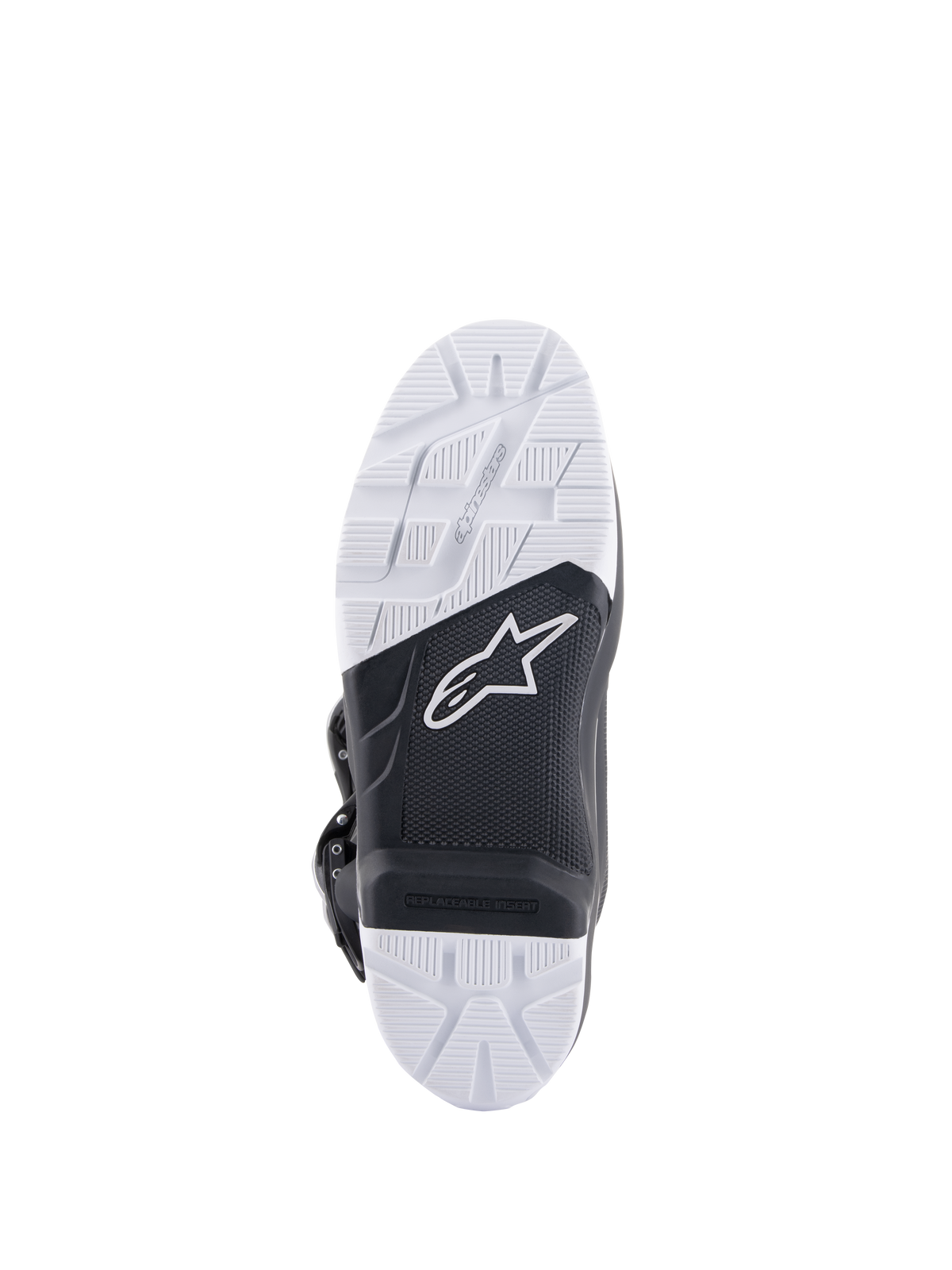Alpinestars Tech 7 Enduro Boots, sole view showing the specifically engineered compound outsole, black and white dual-tone design with textured grip patterns, featuring the white star logo and a replaceable footpeg insert.