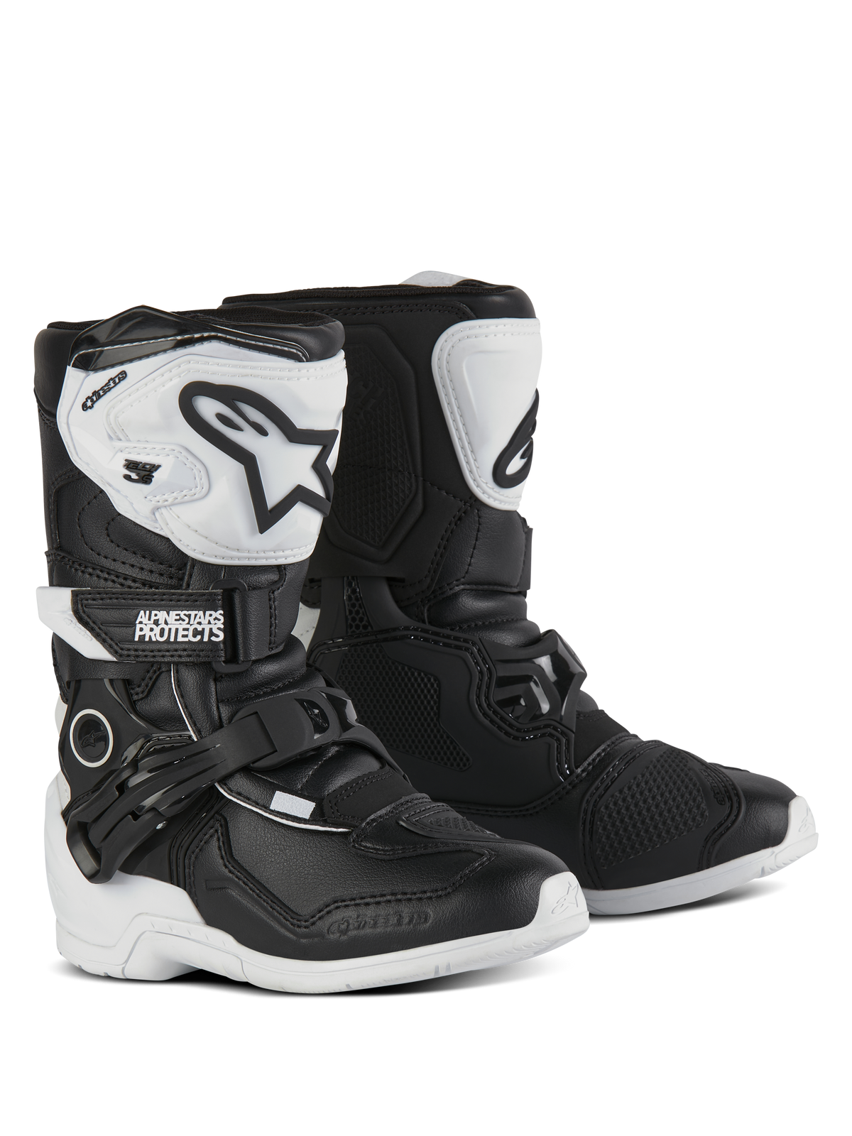 Alpinestars Kids Tech 3S Boots, Motocross Boots, Black and White, featuring white TPU shin plates with black Alpinestars logos, adjustable buckle and hook-and-loop closures, durable rubber outsoles for youth off-road protection.