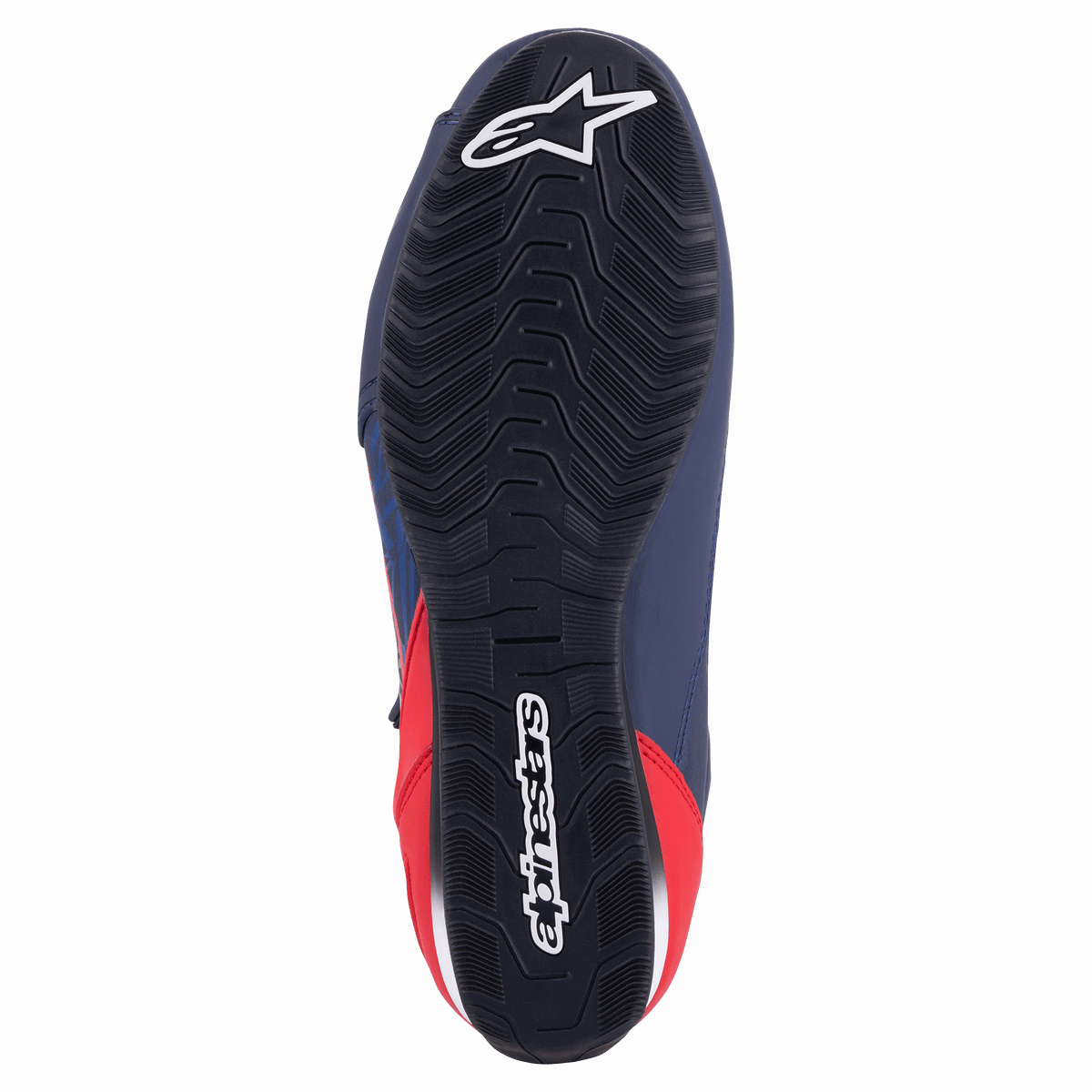 Alpinestars Austin køresko, Night Navy og Bright Red, set nedefra, sort gummiydersål med tekstureret bølget greb og hvidt Alpinestars-logo
