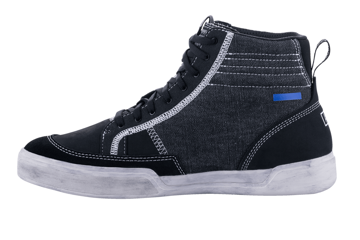 Alpinestars Ageless Riding Shoes, Black and Cool Gray motorcycle shoes, side view, canvas and suede construction with white contrast stitching, high-top sneaker style with off-white sole and black laces.