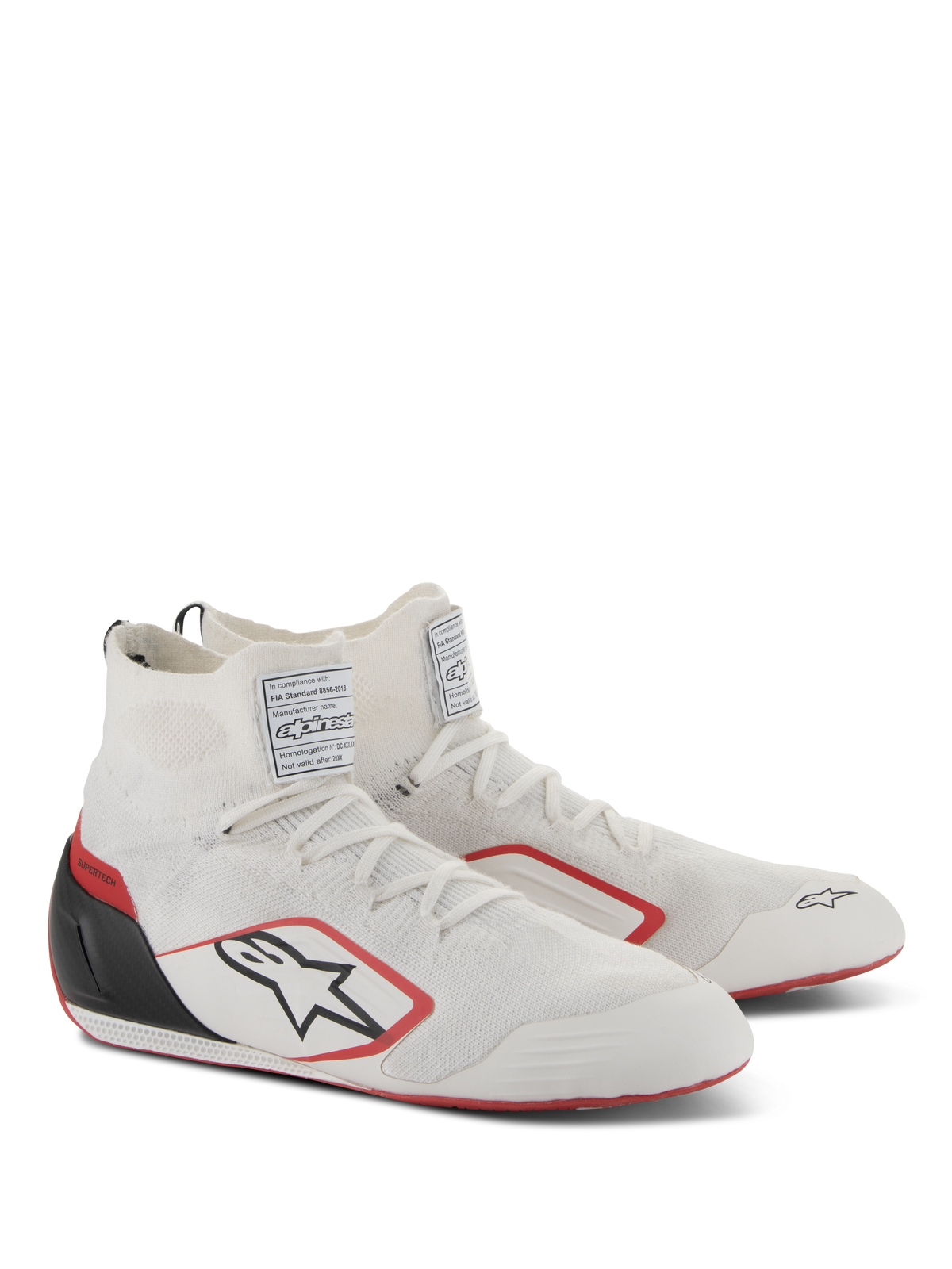 Alpinestars Supertech Shoes, Auto Racing Footwear, White Red and Black, featuring a fully knitted upper, black carbon fiber heel cup, and red accents on the sole and logo, professional motorsport shoes with FIA/SFI certification labels on the tongue.