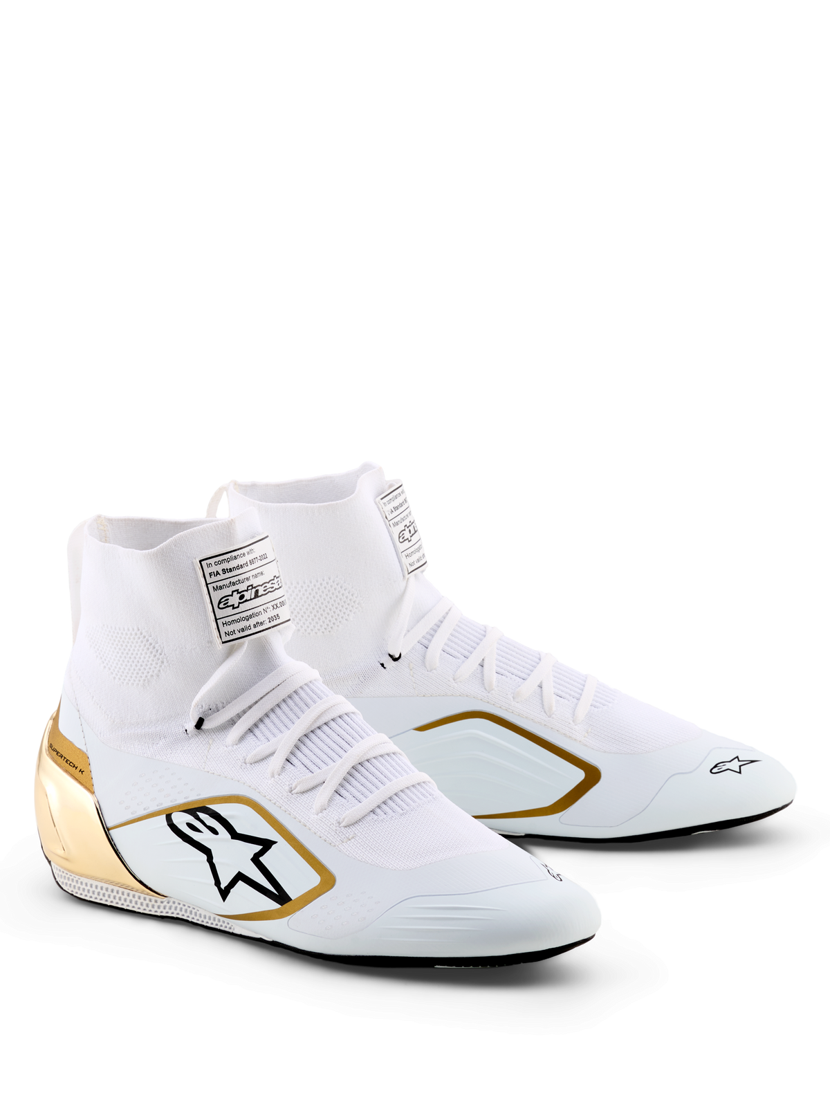 Alpinestars Supertech K-sko - FIA, kartingsko, hvid, sort og guld, med strikket overdel, metallisk guldhælkappe, sort Alpinestars-logo med guldkant, professionelt racerfodtøj til karting