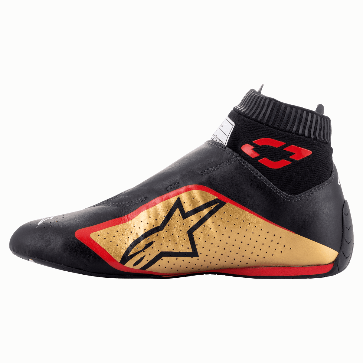 Alpinestars Supermono V2 Shoes FIA, Auto Racing Shoes, Black Gold and Red, side profile view featuring a sleek one-piece leather construction, gold side panel with black star logo, red accents, and a ribbed elastic collar.
