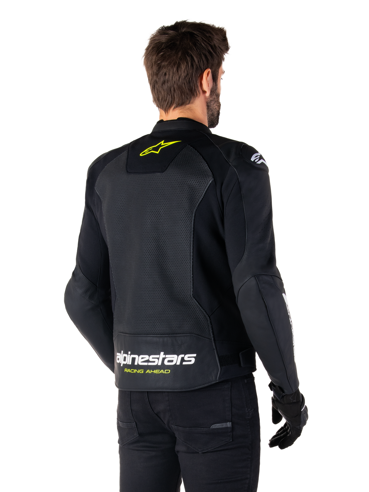Alpinestars Faster V3 Airflow læderjakke, sort, hvid og gul fluo, set bagfra, med et stort perforeret læderrygpanel til ventilation, gult stjernelogo på kraven og hvidt Alpinestars-logo med gul 'Racing Ahead'-tekst på den nederste kant, sport motorcykelkøreudstyr