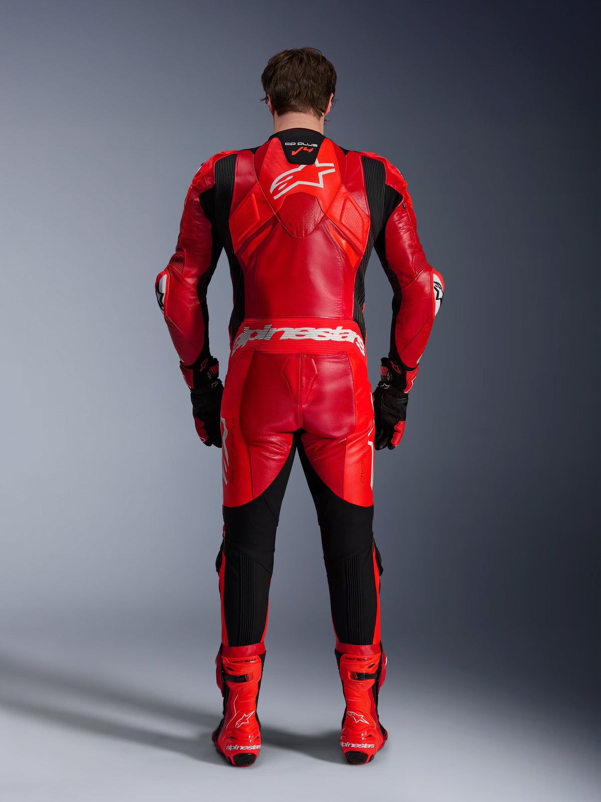 Alpinestars GP Plus V4 Sprint 1PC Leather Suit, red and black motorcycle racing suit with aero hump, back view.