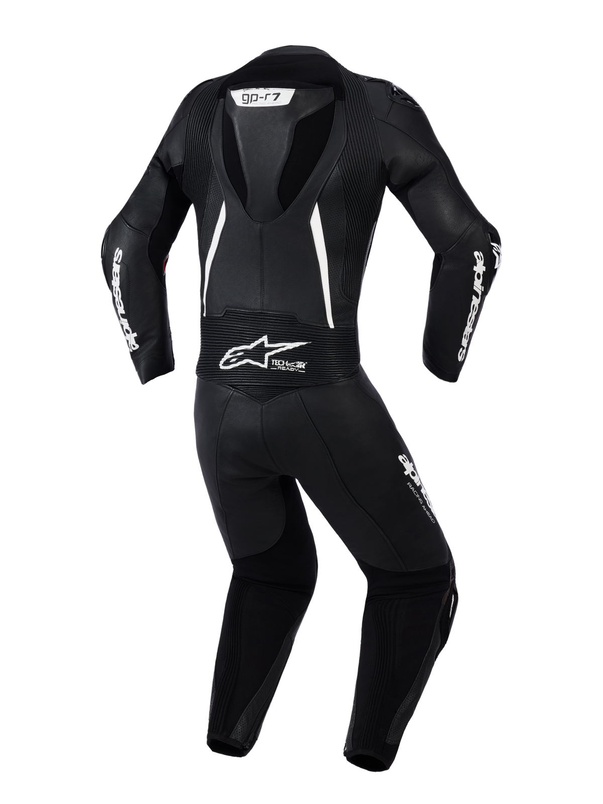 Alpinestars Stella GP-R7 2-delt læderdragt til kvinder, set bagfra i sort med hvide detaljer, integreret aerodynamisk pukkel, harmonika-strækpaneler på skuldre og lænden, perforeret læder til ventilation, tydelig Alpinestars-branding.