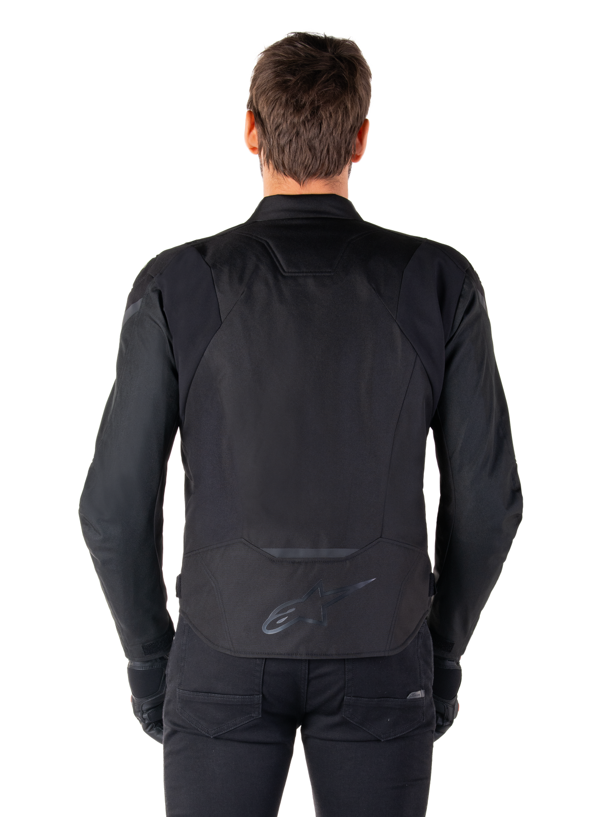 Alpinestars T-Jaws V4 vandtæt jakke, tekstil motorcykeljakke, sort sort, set bagfra med Alpinestars logo på lænden, sportslig pasform til landevejskørsel