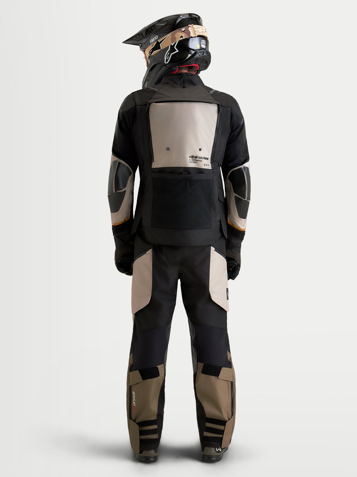 Alpinestars Harok V2 Drystar Gear Set, adventure touring motorcycle jacket and matching pants, back view on a model wearing a helmet, black, beige, and khaki, waterproof textile construction with Drystar performance