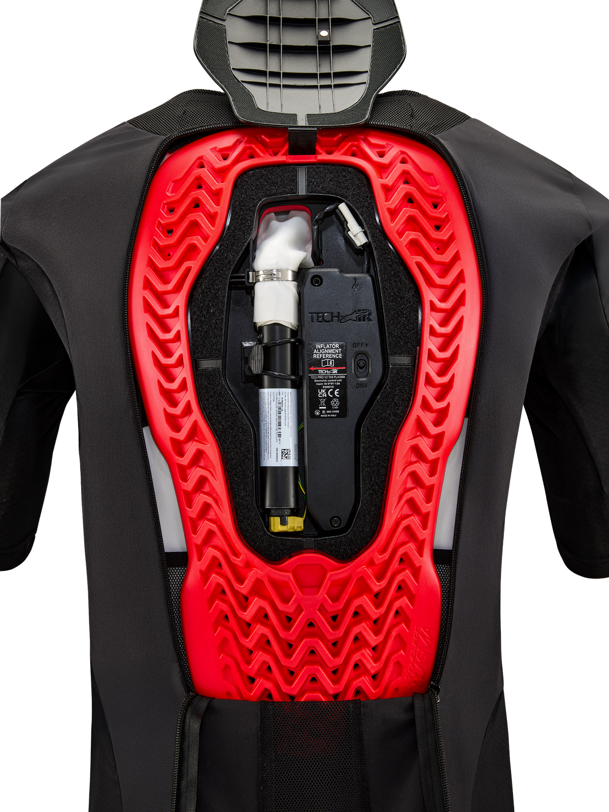 Alpinestars Tech-Air 5 Plasma Airbag System, indvendig visning af den installerede sorte reservepatron og elektroniske kontrolenhed, integreret i en stærkt rød Nucleon Plasma-rygbeskytter i en sort beskyttelsesvest