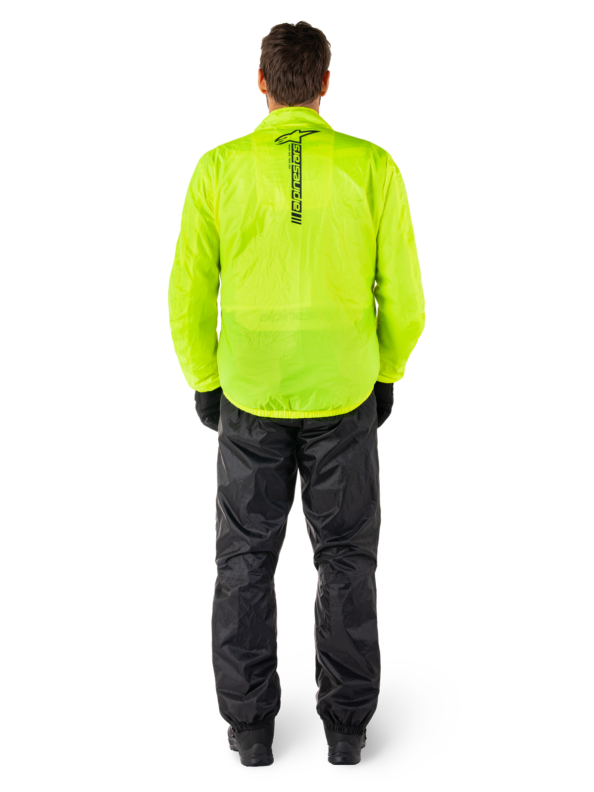 Alpinestars Hurricane Rain V2 jakke og bukser, vandtæt motorcykelregnsæt, klar fluorescerende gul jakke med lodret sort branding på ryggen, sorte bukser, letvægts tekstilmateriale designet til beskyttelse under kørsel i vådt vejr