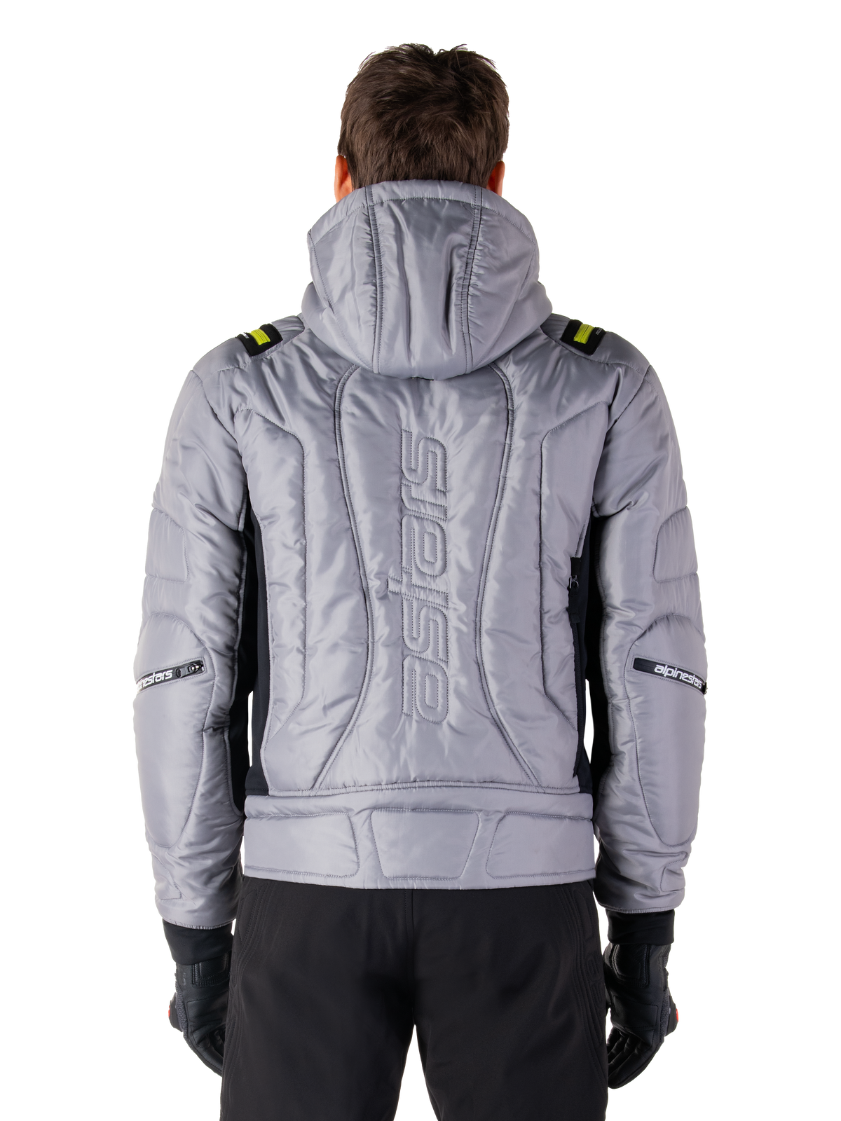 Alpinestars Mohobbs vandtæt jakke, set bagfra, Lunar Gray med Lime Punch-detaljer, quiltet og polstret konstruktion med lodret Astars-ordmærke, bomber-stil med hætte til urban motorcykelkørsel