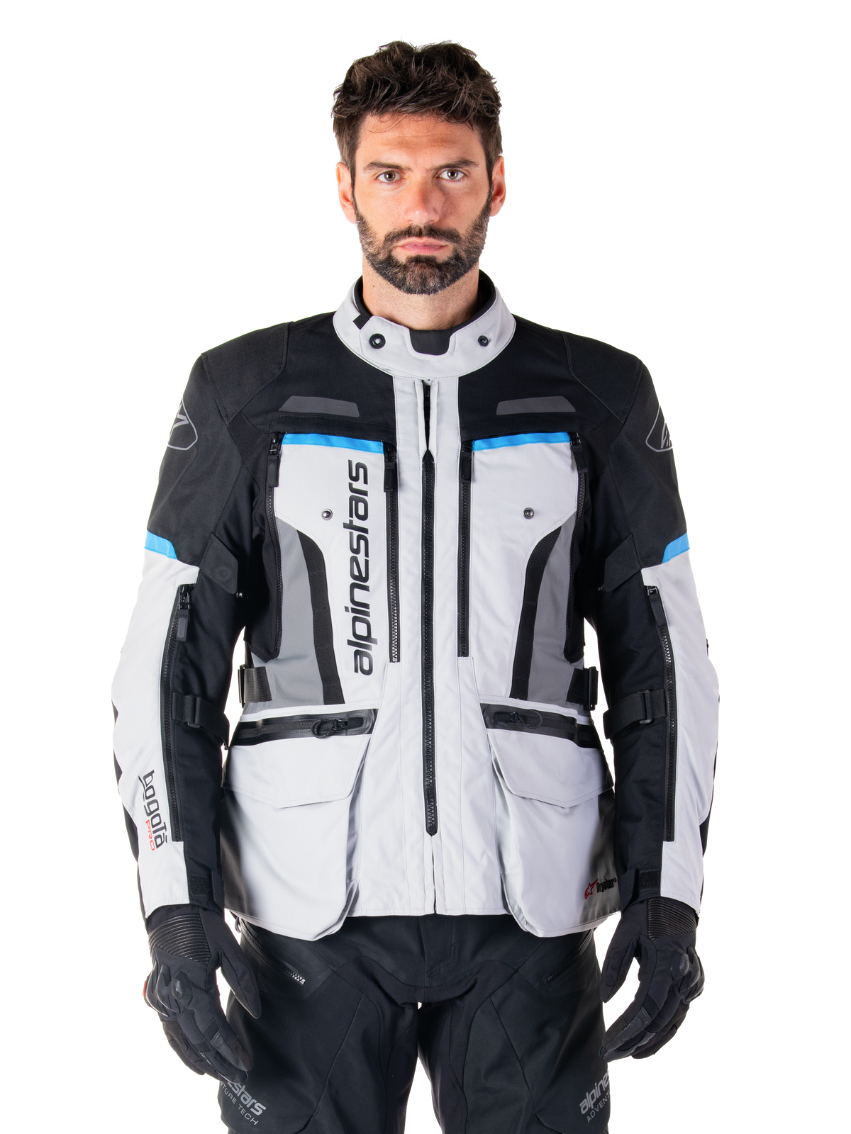 Alpinestars Bogota Pro Drystar jakke, vandtæt adventure touring-motorcykeljakke i grå, sort og cyan.