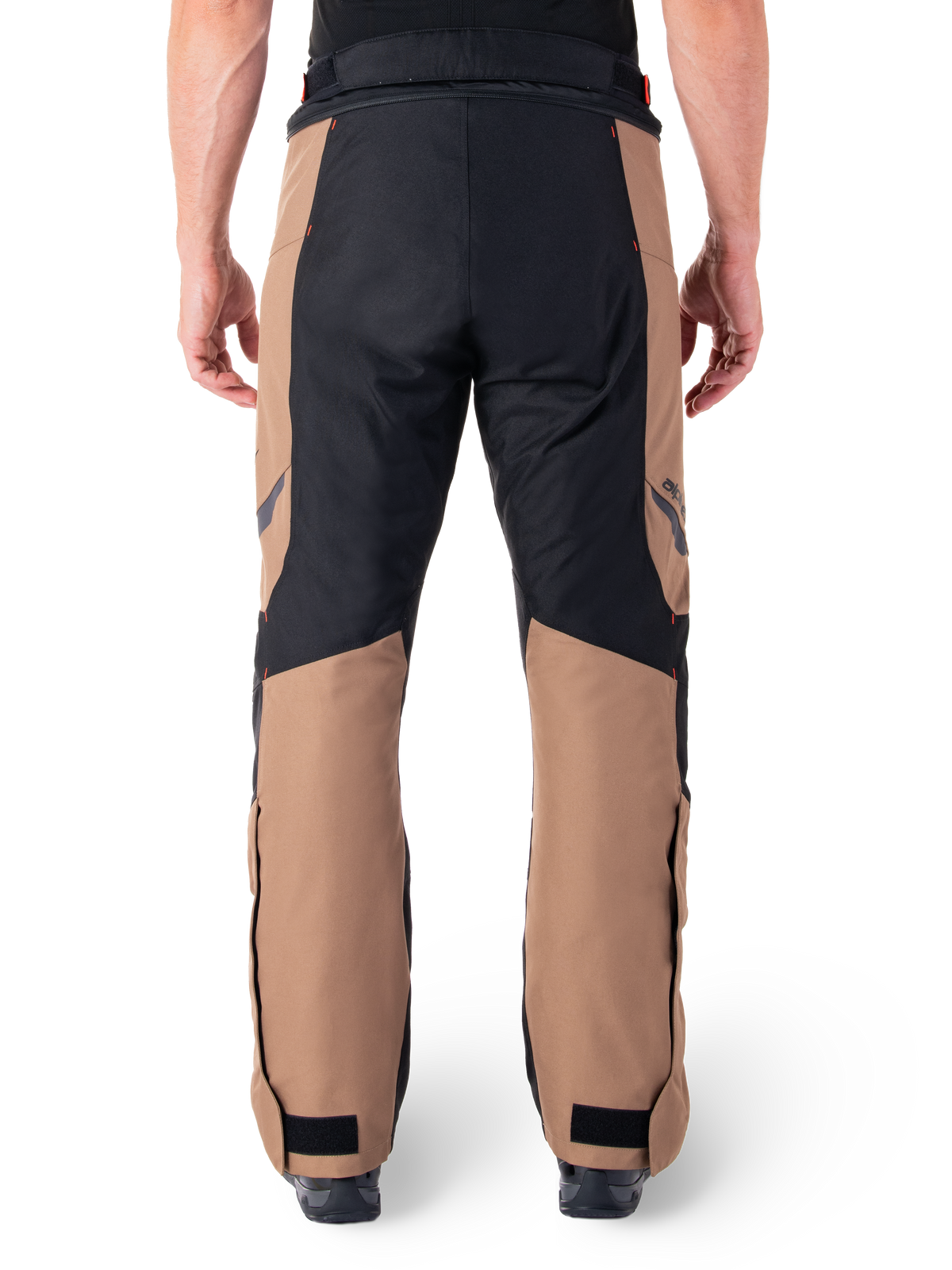 Alpinestars St-1 Waterproof Pants, Motorcycle Touring Pants, Dark Khaki Sand and Black with Red Fluo accents, rear view, featuring a durable textile construction, ergonomic panels for mobility, and adjustable hook and loop ankle closures.