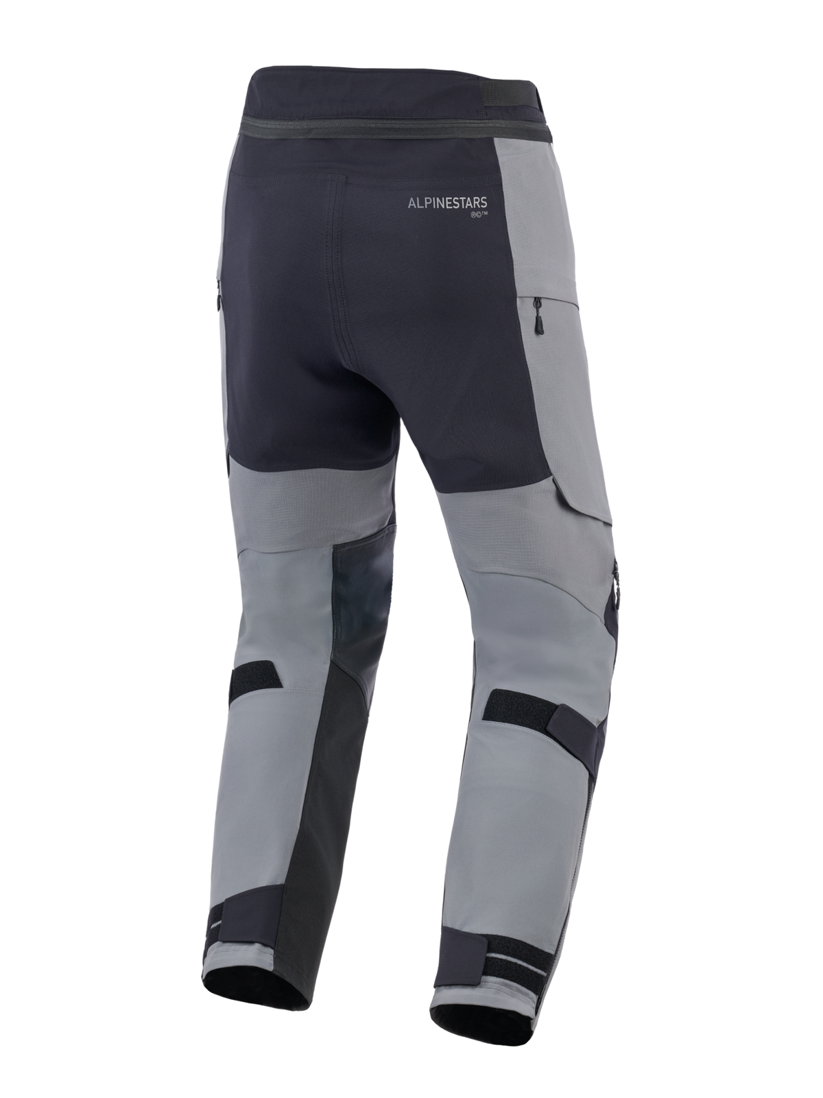 Alpinestars Andes Pro Drystar® XF bukser, adventure motorcykelbukser, mørkegrå og sort, set bagfra med justerbare stropper ved læggene, Alpinestars-branding og vandtætte lynlåsdetaljer