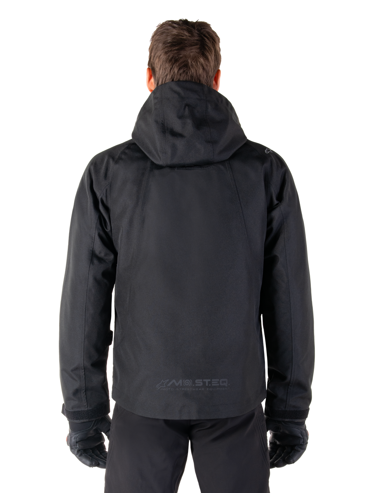 Alpinestars Morush Vandtæt Parka, sort motorcykeljakke til herrer, tekstil, bagfra med hætte og reflekterende MO.ST.EQ. logo.
