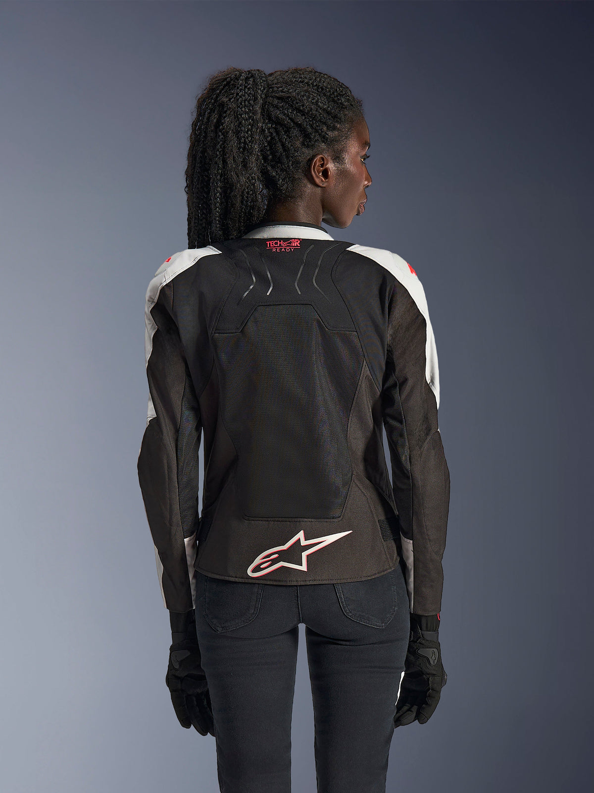 Alpinestars Stella SMX Air-jakke, motorcykeljakke til damer, Ice Gray og sort med Coral Fluo-detaljer, set bagfra med Tech-Air Ready-branding og hvidt Astar-logo, mesh-konstruktion for høj ventilation, sporty pasform