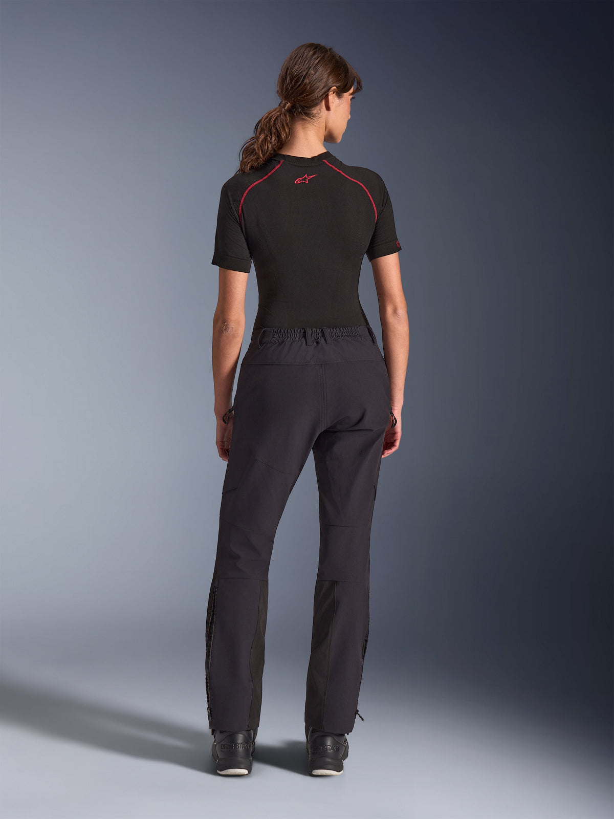Alpinestars Woman Stella Flex-AST Explorer Pants, Black, rear view, adventure riding pants featuring stretch textile construction with ripstop reinforcements on the seat and knees, zippered lower legs, and a fitted feminine design.