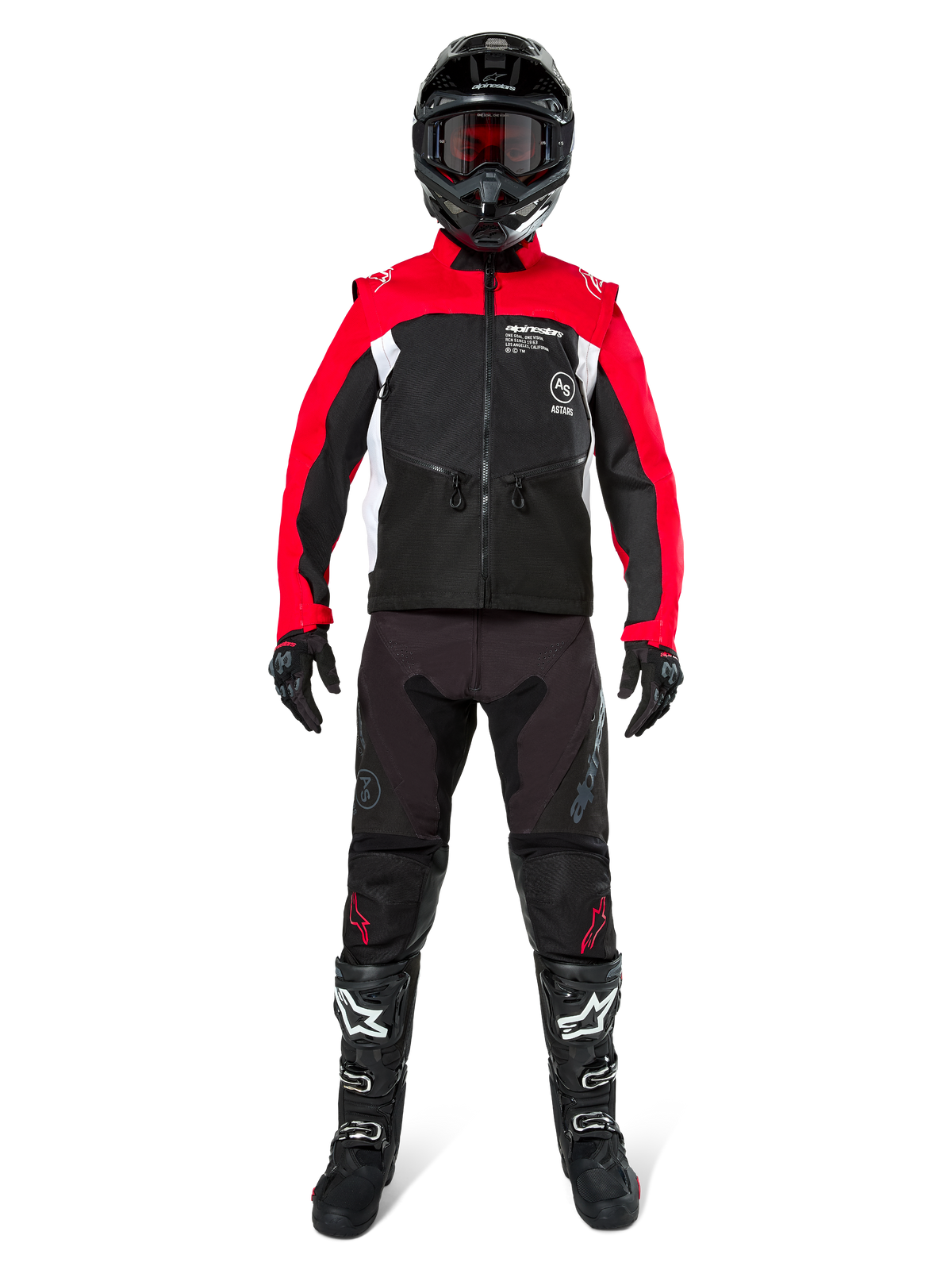 Motocross-kører iført komplet off-road-udstyr, Alpinestars Pro-Dura jakke i sort, lys rød og hvid, sorte bukser med røde detaljer, sort hjelm med røde goggles, sort-hvide støvler, koordineret sæt til enduro- og trailkørsel