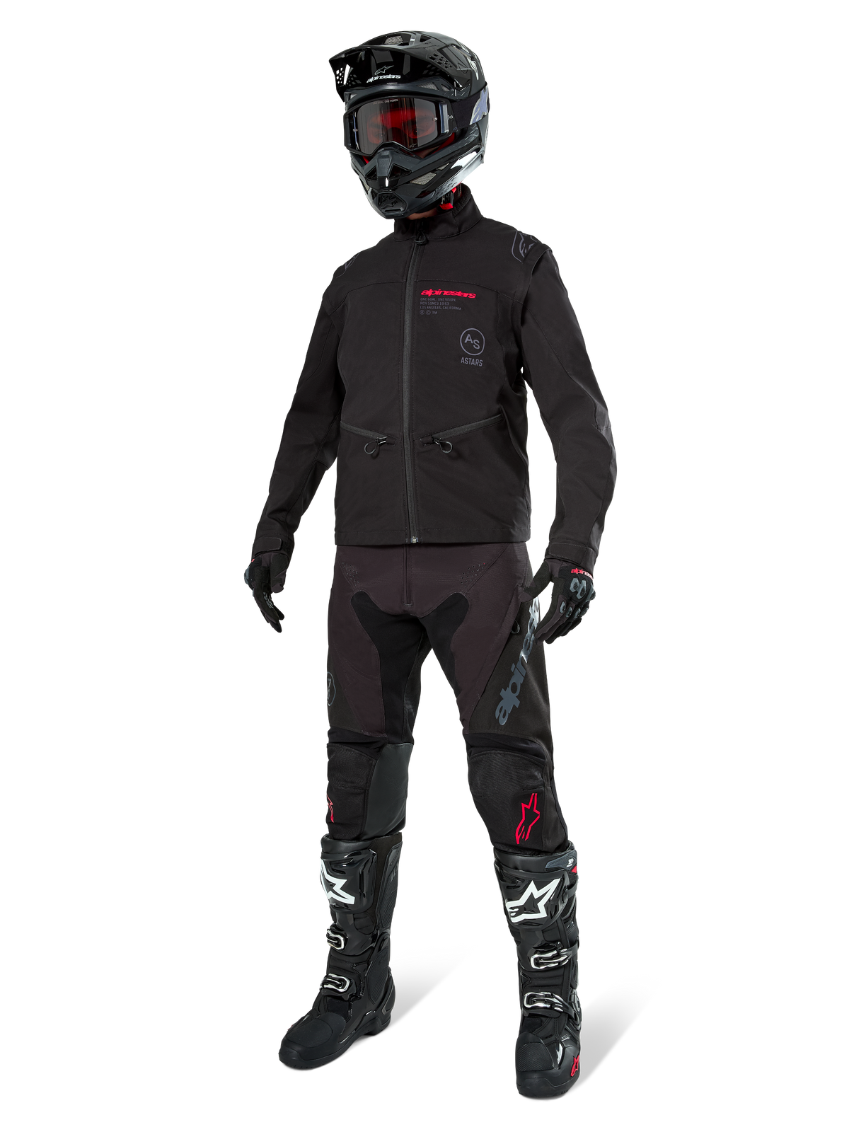 Alpinestars Lite-Dura Softshell-jakke, sort, båret af en mannequin som en del af et komplet off-road udstyrssæt inklusive sorte bukser, sort-hvide støvler, sort hjelm med røde goggles, professionel motocross- og endurobeklædning.