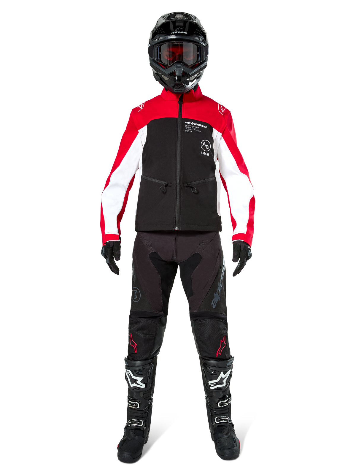 Motocross rider wearing the Alpinestars Lite-Dura Softshell Jacket in Black, Bright Red, and White, coordinated with black off-road pants, black and white boots, and a black helmet with goggles, complete gear setup for enduro racing