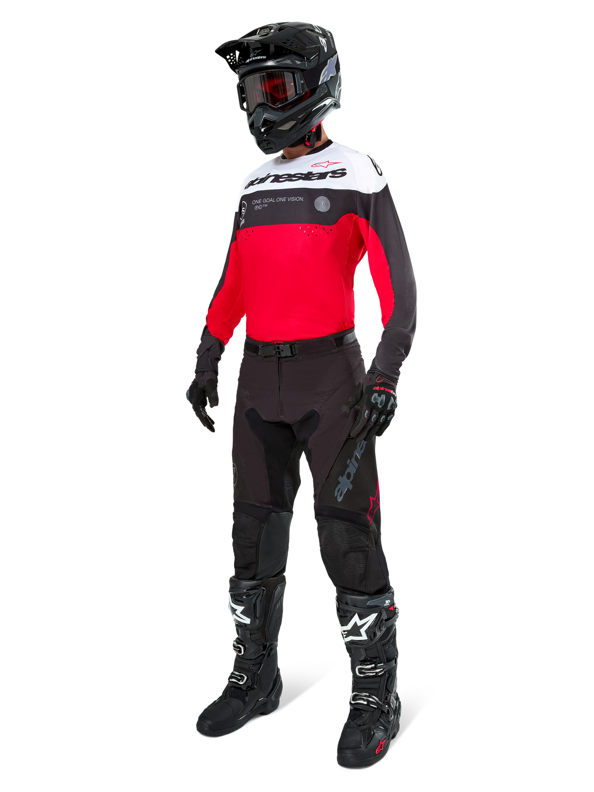 Alpinestars Pro-Dura bukser i Black Magnet White, båret af en kører med en matchende rød, sort og hvid trøje, sort hjelm og sorte off-road støvler, komplet professionelt enduro-racerudstyrssæt til terrænkørsel
