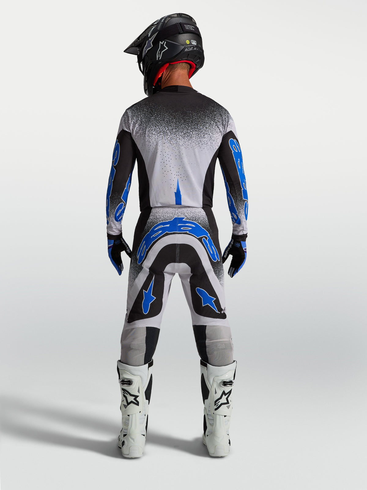 Alpinestars Supertech Hiten AFD Bukser, herre-motocrossudstyr i blå og hvid, atletisk pasform set bagfra.