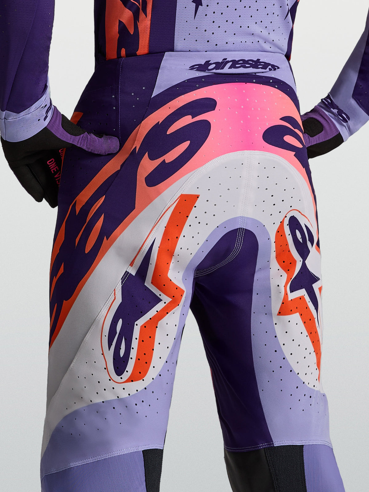 Alpinestars Supertech Dyna Pants, Men's Motocross Racing Pants, Purple and Pink Fluo, featuring a ventilated athletic fit.