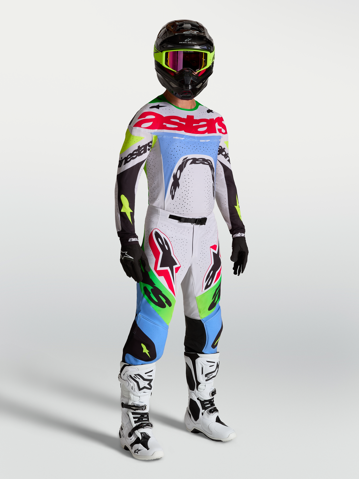 Alpinestars Supertech Dyna Pants, Men's Motocross Gear, Light Lilac and Green Fluo, on-model as part of a full racing kit.