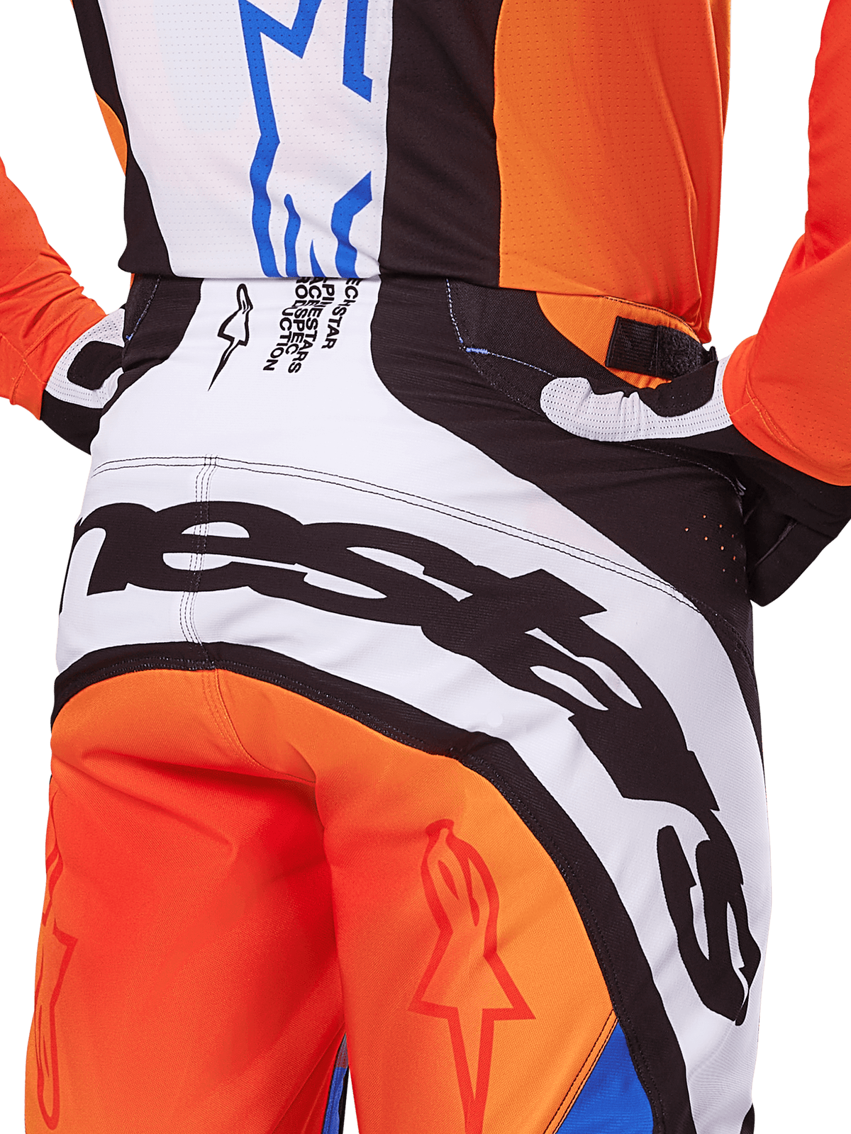 Alpinestars 2025 Techstar Melt Pants, Motocross Pants, Orange and Blue, close-up rear view of the seat and waistband, bold black branding on white background, orange panels with red star logos, athletic performance gear for off-road racing