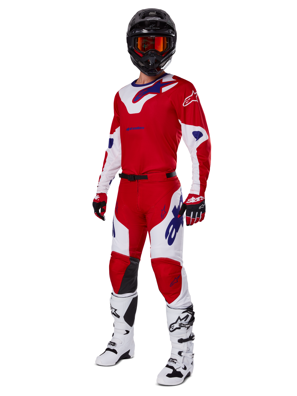 Alpinestars 2025 Racer Veil bukser, motocross-bukser, klar rød og hvid, båret som en del af et komplet racersæt med matchende rød og hvid trøje, sort hjelm med orange briller, hvide støvler og røde handsker, med markante blå Alpinestars-logoer.