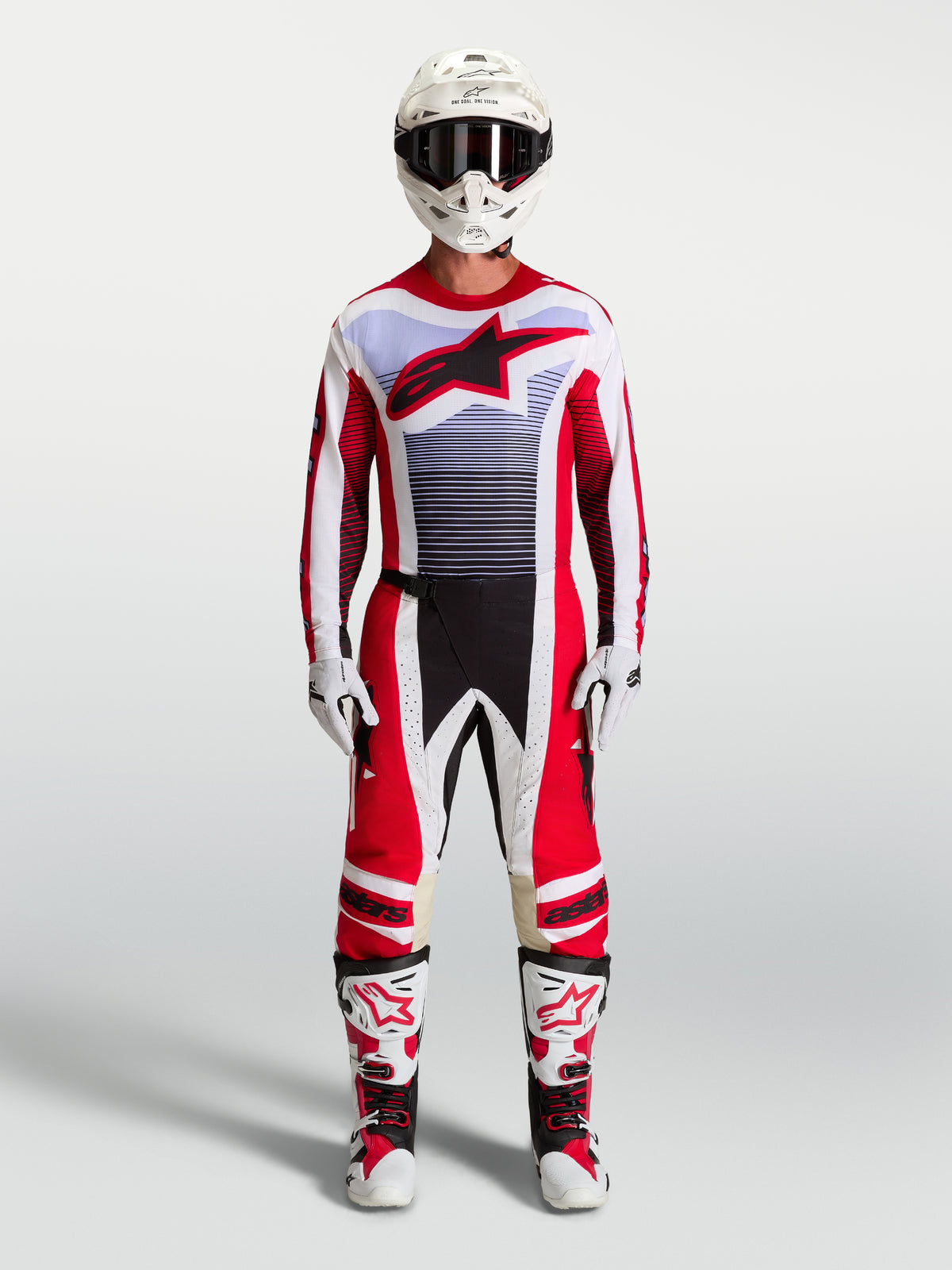 Alpinestars Techstar Maven bukser og motocross-sæt til herre, rød og hvid med lilla detaljer og matchende motorcykelstøvler.