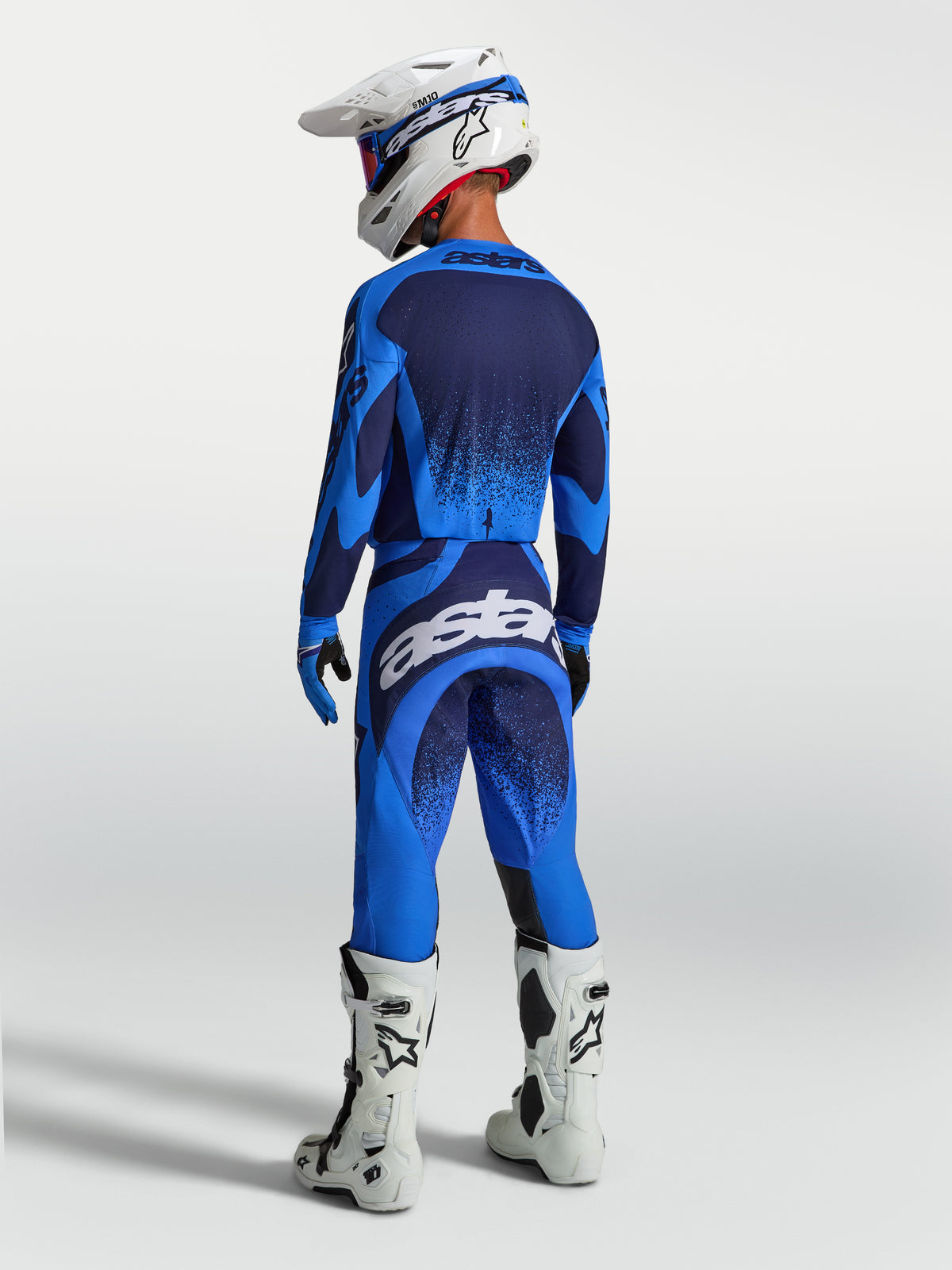 Alpinestars Techstar Swan bukser, blå og hvide herre-motocrossbukser set bagfra med en atletisk race-pasform.