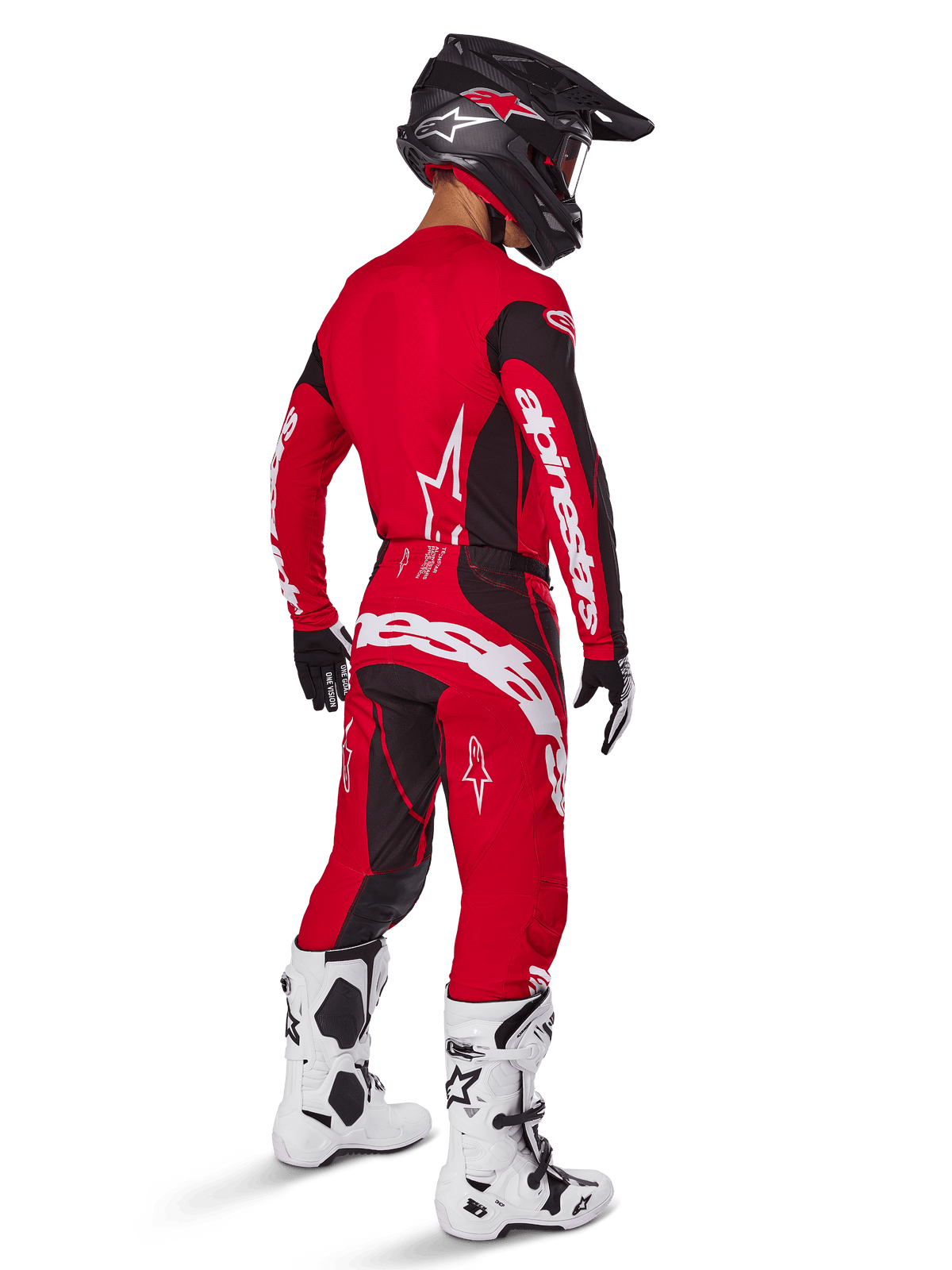 Alpinestars 2025 Techstar Dreem bukser, motocross-bukser, klar rød og sort, set bagfra på en kører i komplet racersæt med matchende rød trøje, sort hjelm og hvide støvler, med markant hvidt Alpinestars-branding og sorte stretch-paneler.