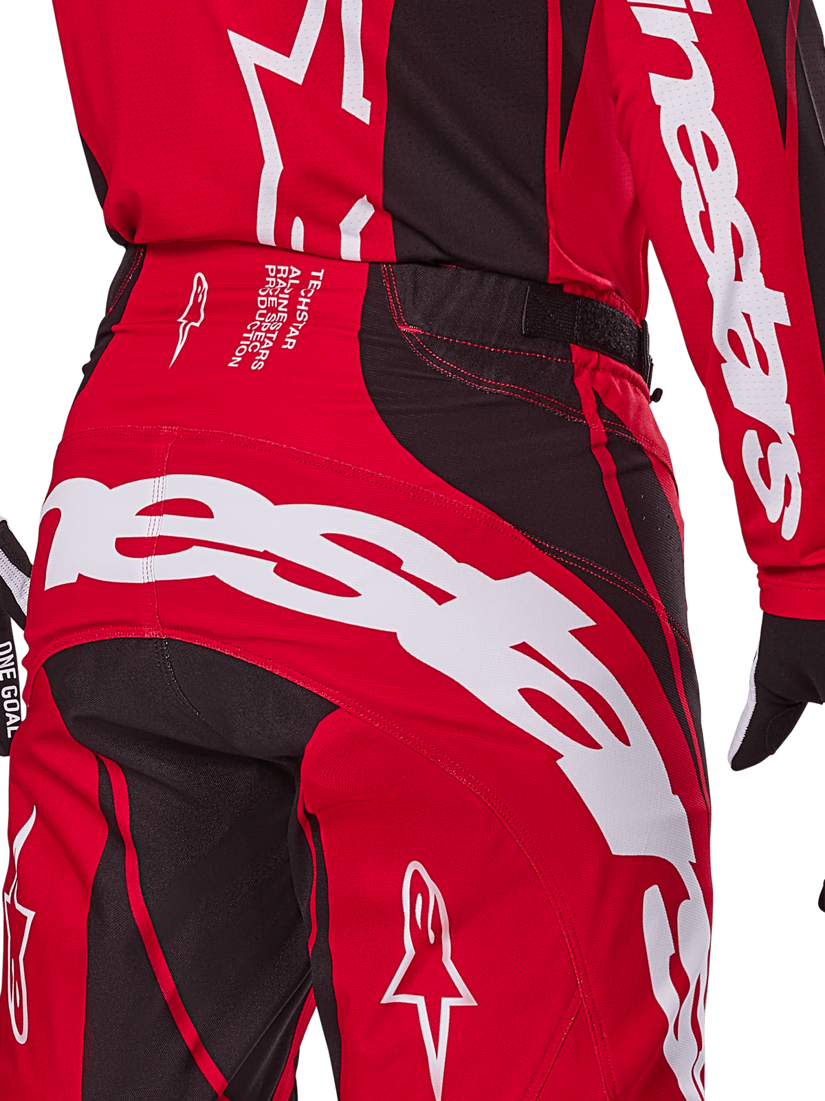 Alpinestars 2025 Techstar Dreem bukser, motocross-bukser, klar rød og sort, nærbillede af bagside og talje med hvid branding, sorte strækpaneler og tekniske detaljer på linningen, designet til off-road racing