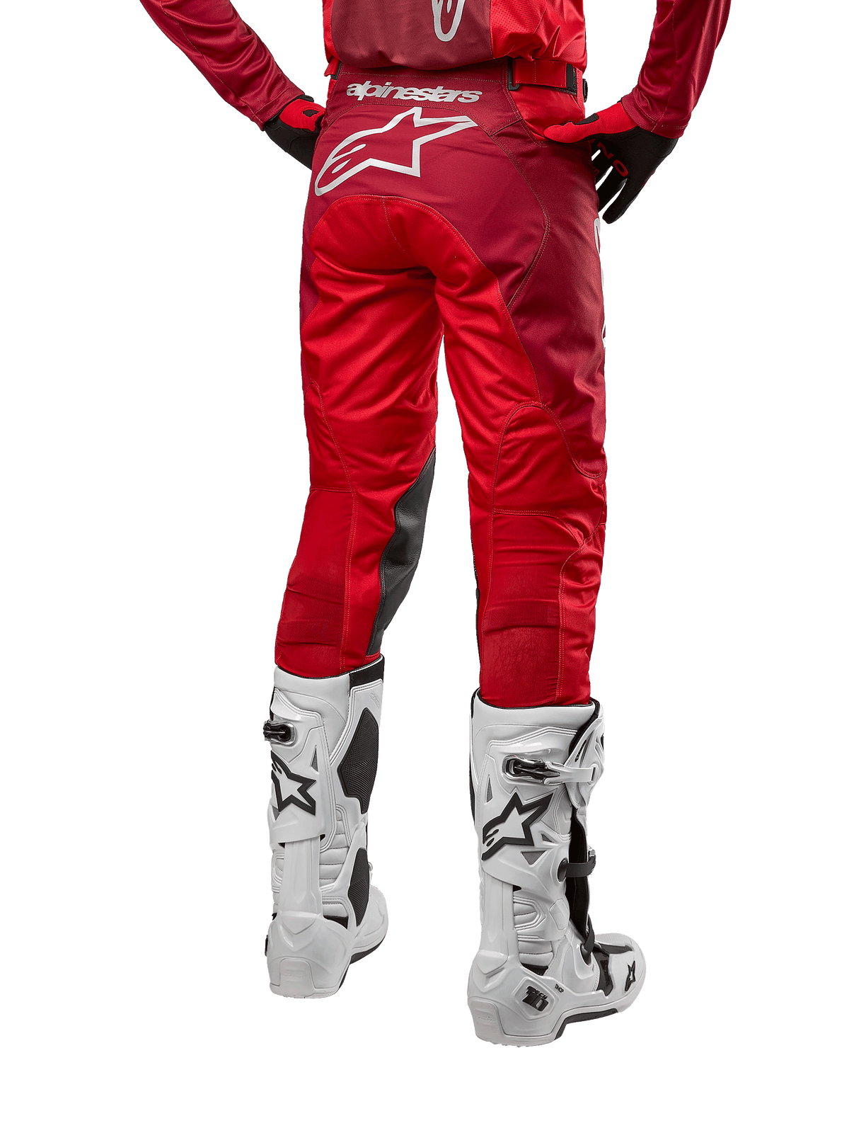 Alpinestars 2024 Racer Hoen bukser, motocross-bukser, Mars Red Burgundy, set bagfra med et stort hvidt Astar-logo bagpå, sorte indvendige knæpaneler, vist med hvide motocrossstøvler, højtydende off-road udstyr