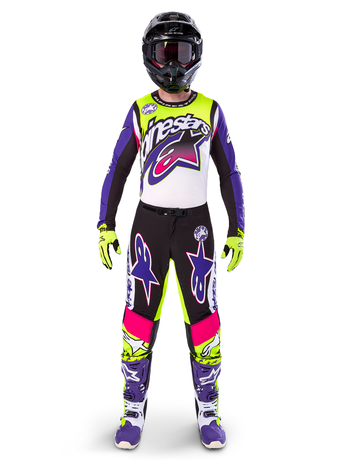Motocross-kører iført komplet racerudstyr, Limited Edition Supertech Dirt Studios trøje og bukser i hvid, lilla og neon gul, sort hjelm med goggles, lilla og hvide støvler, koordineret farverigt outfit til off-road motocross-løb