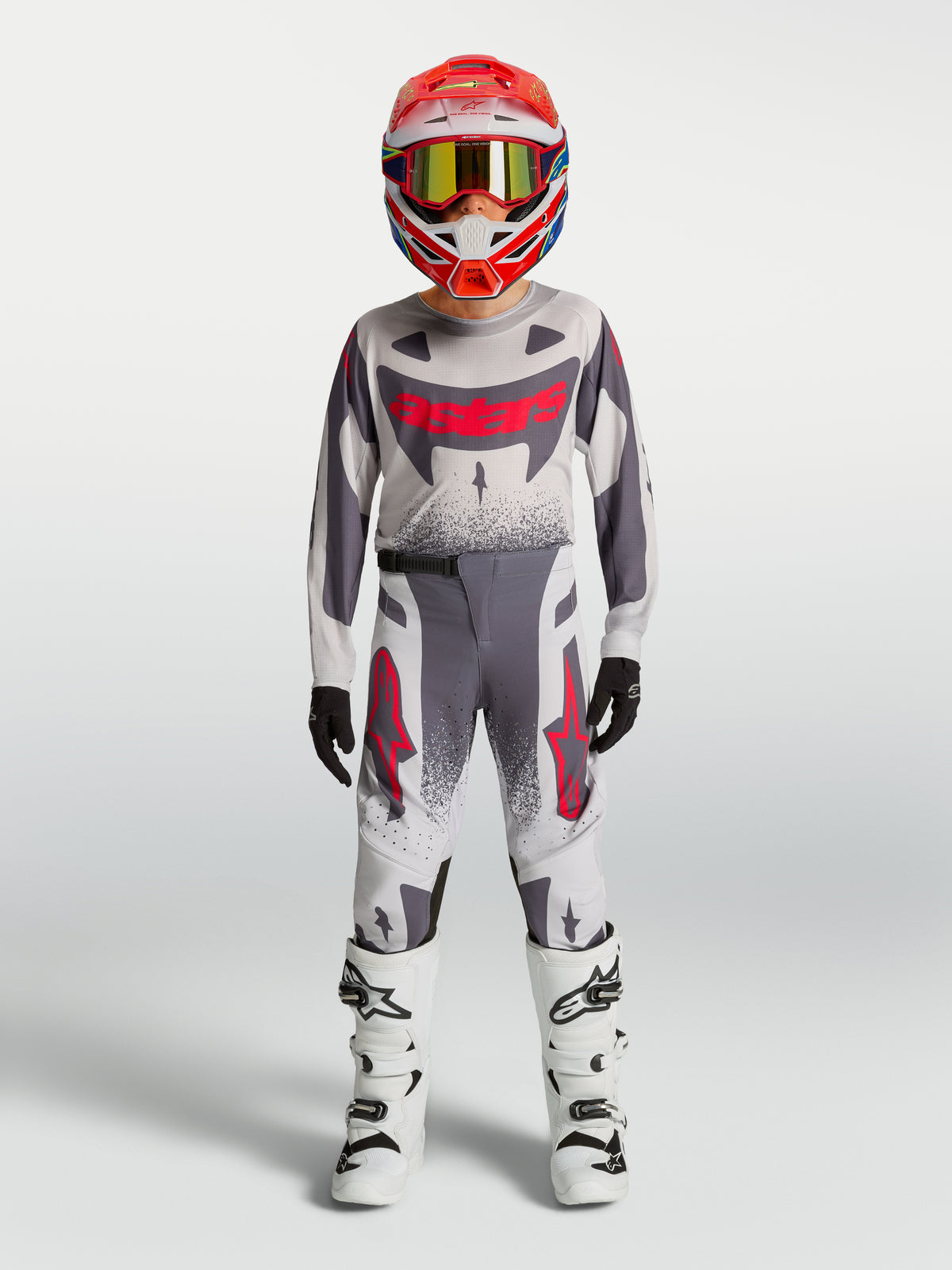Alpinestars Supertech Swan bukser, motocross-racerudstyr til unge, grå og rød fluo, atletisk pasform.