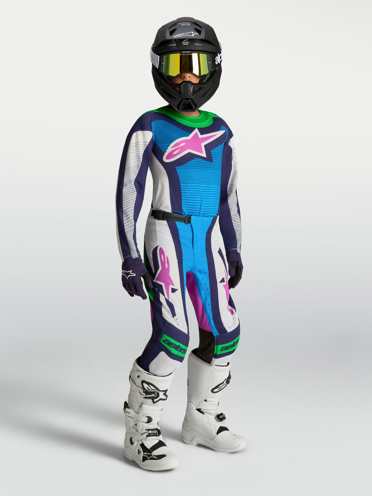 Alpinestars Supertech Maven bukser, motocrossbukser til unge, blå og hvid med grøn, atletisk performance-pasform.