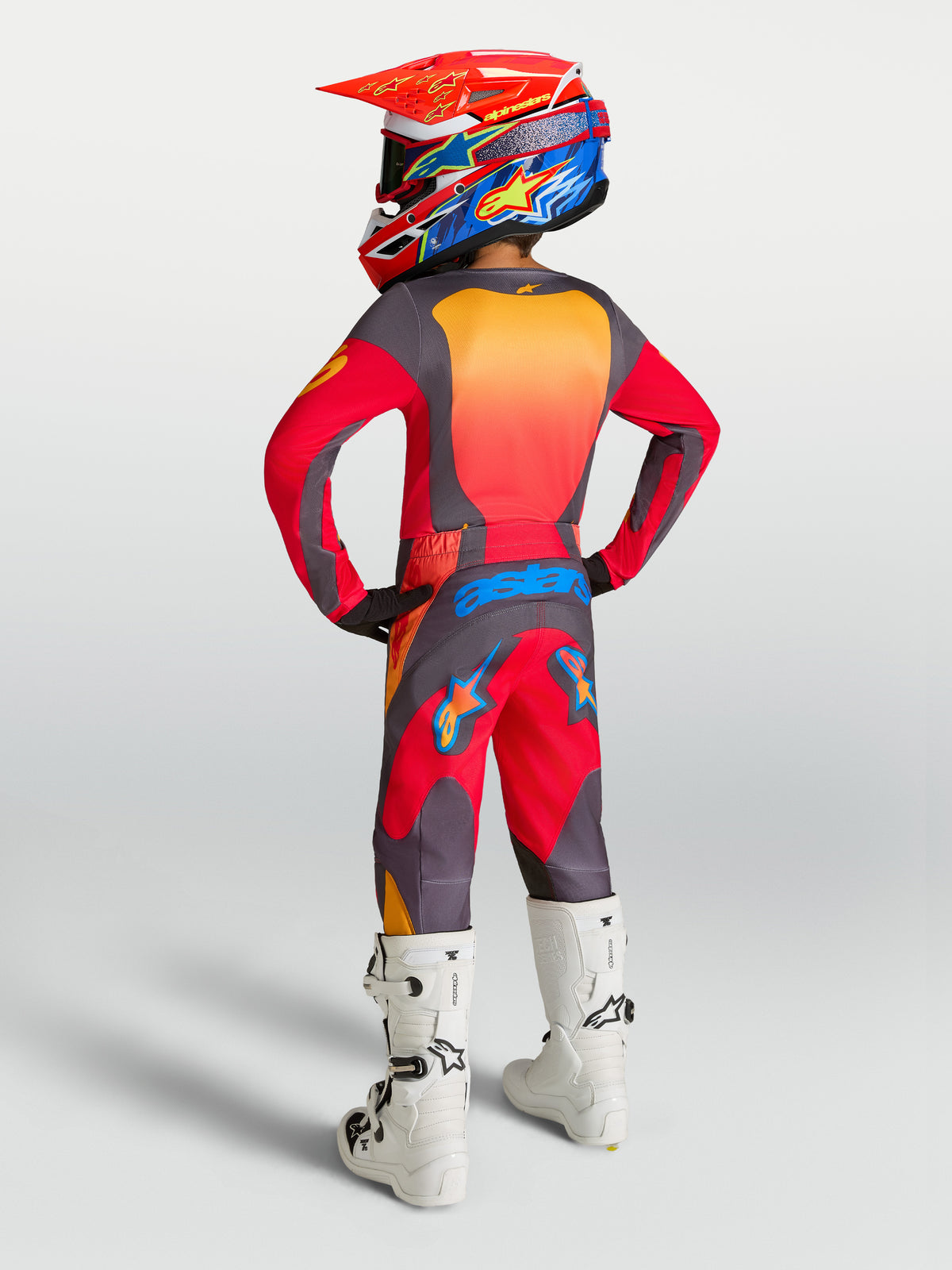 Alpinestars Youth Fluid Hunt Pants, Fire Red and Graystone motocross riding gear for off-road performance.