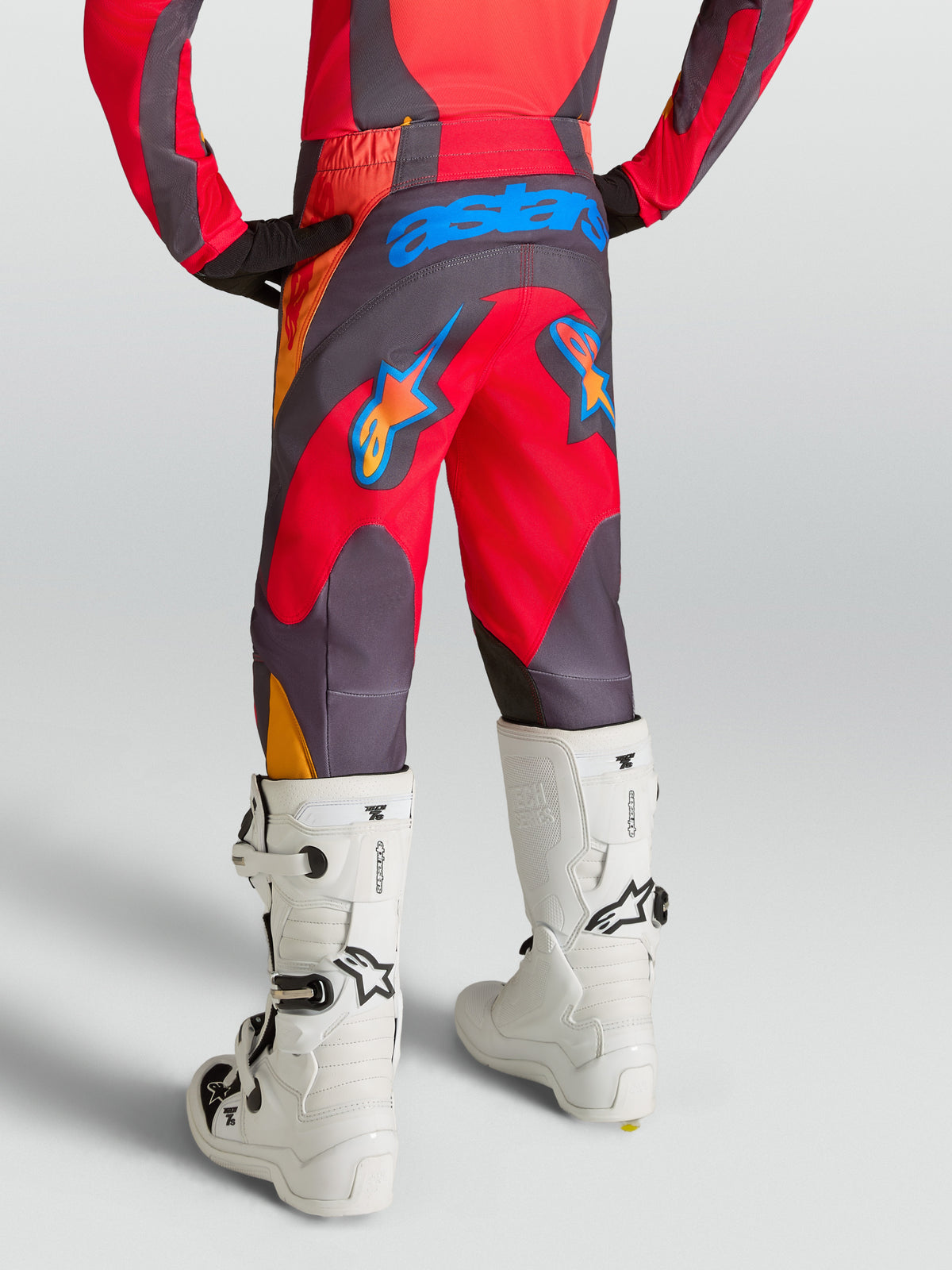 Alpinestars Youth Fluid Hunt Pants, Youth Motocross Riding Pants, Fire Red and Graystone, durable 600D seat.