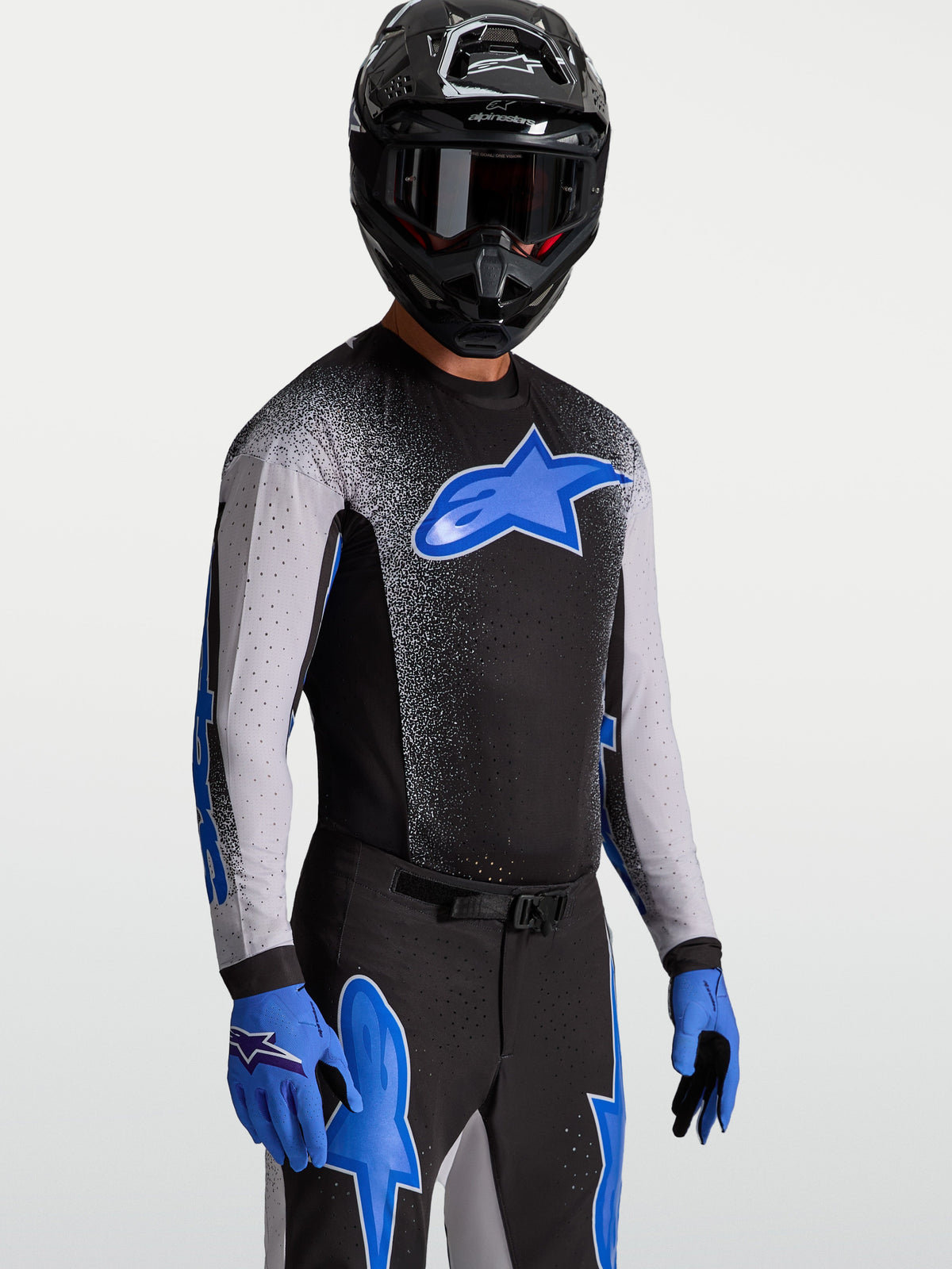 Alpinestars Supertech Hiten AFD trøje, herre motocross racingtrøje, sort og blå, i strækmesh med laserskåret ventilation.