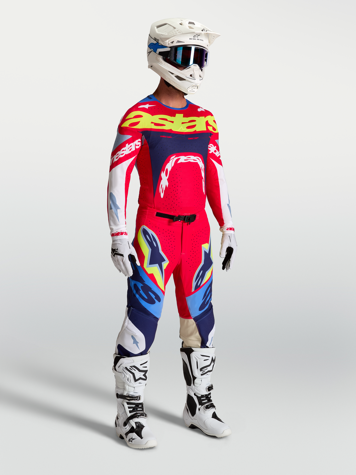 Alpinestars Supertech Dyna Jersey in fire red and navy blue, a pro-level athletic motocross gear set for racing performance.
